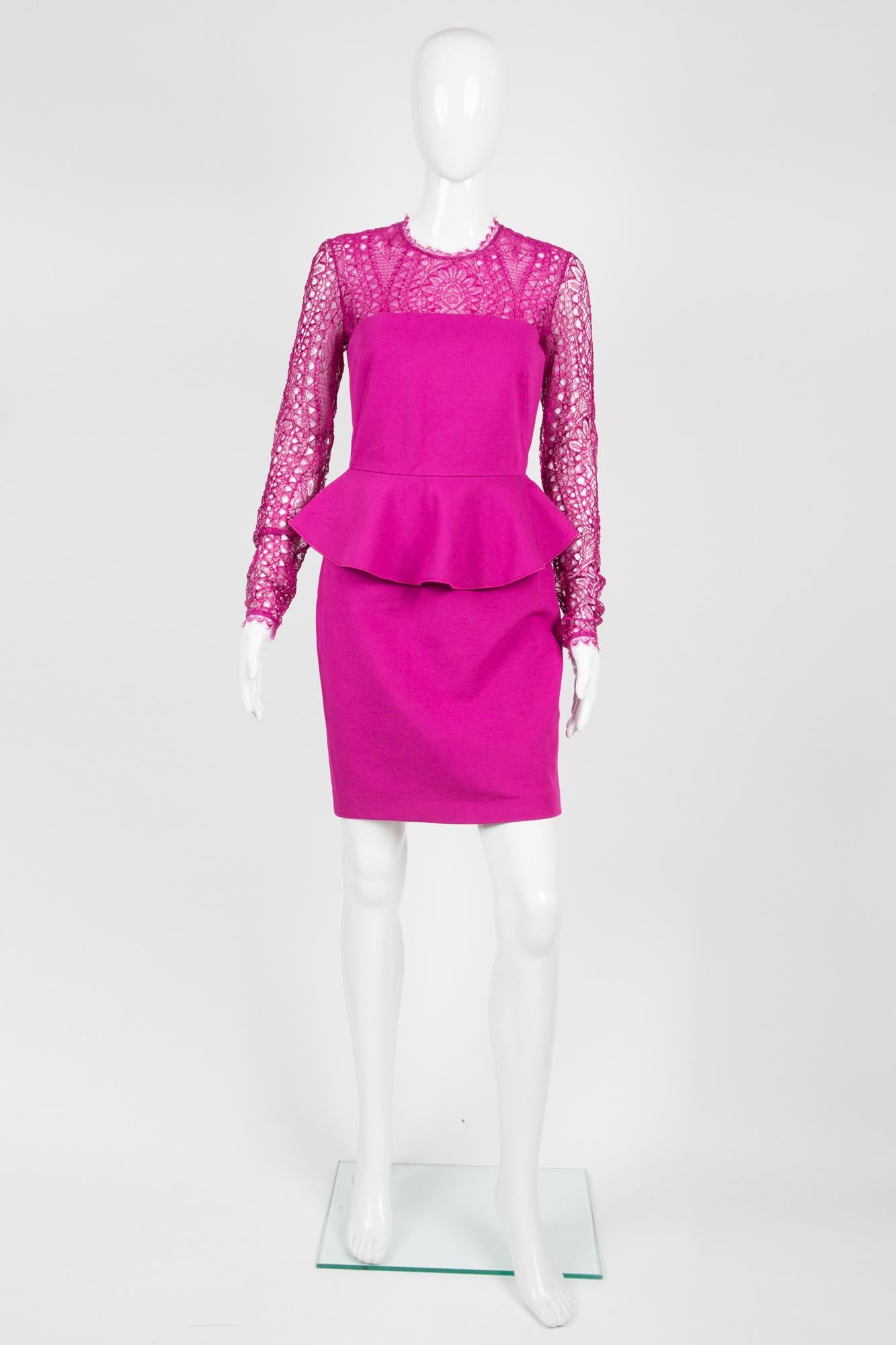 Emilio Pucci pink peplum dress featuring a lace yoke extending to the long sleeves, a stretch material, a peplum detail and a back zipper. 
Composition: 85%viscose, 11% polyamide, 4% elastan
Lace: 75% viscose, 25% polyamide
In excellent vintage