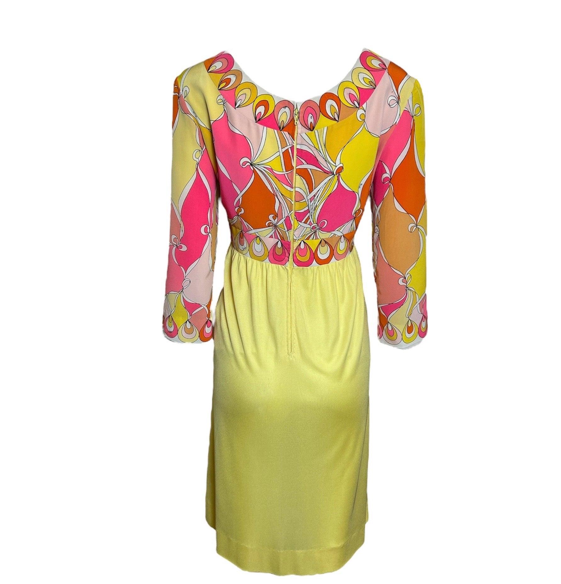 This may be the flirtiest Pucci number we've seen yet. How adorable is the fluttery silk crepe skirt on this babydoll dress? Perfectly breezy and light material, deliciously colorful and playfully psychedelic! The v-neck border design is so