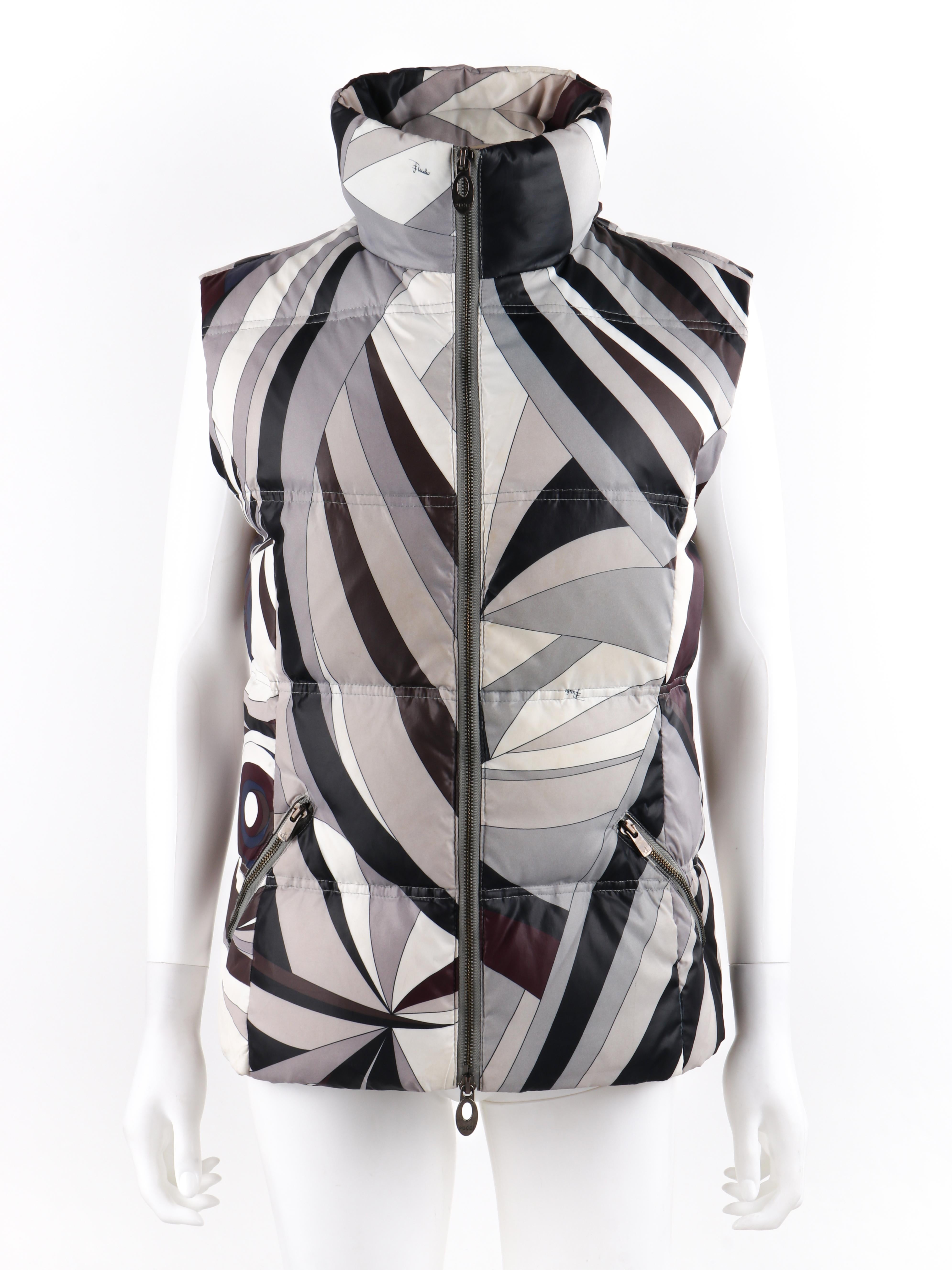 EMILIO PUCCI Pre-Fall 2012 Firenze Signature Op Art Hooded Ski Snow Puffer Vest Jacket
 
Brand / Manufacturer: Emilio Pucci 
Circa: Pre Fall 2012
Style: Hooded puffer vest jacket 
Color(s): Shades of white, gray, blue, purple, and black
Lined: