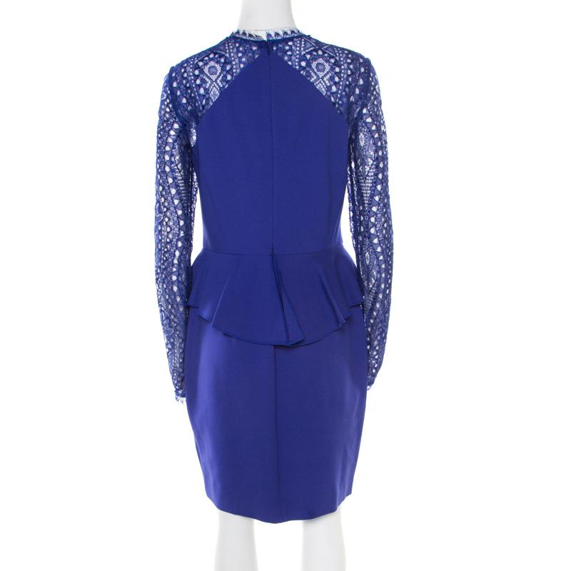 Wear this dazzling Emilio Pucci dress and look like a diva. It features a lace yoke extending to the long sleeves, a peplum detail and a back zipper. Comfortable and stylish, this purple outfit is a must-have in any fashionista's collection.

