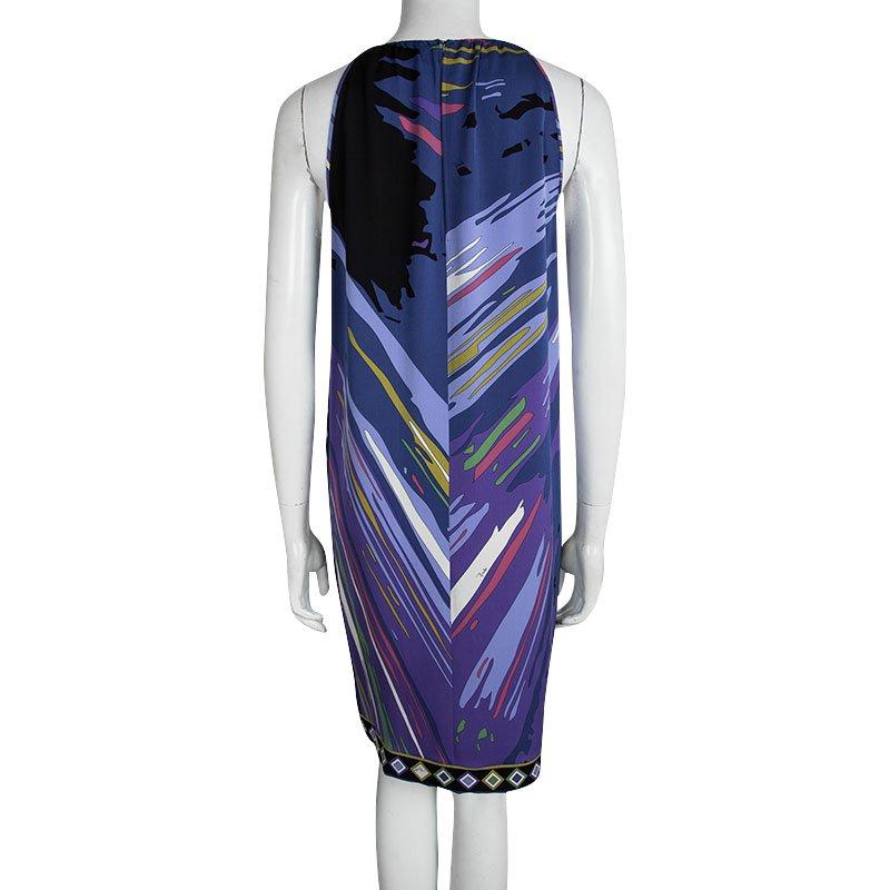 Sashay out like a diva in this Emilio Pucci dress that was created in Italy from silk and elastane. Designed with a halter neck over a gorgeous printed exterior, this purple dress is complete with stunning embellishments on the neck. Assemble the