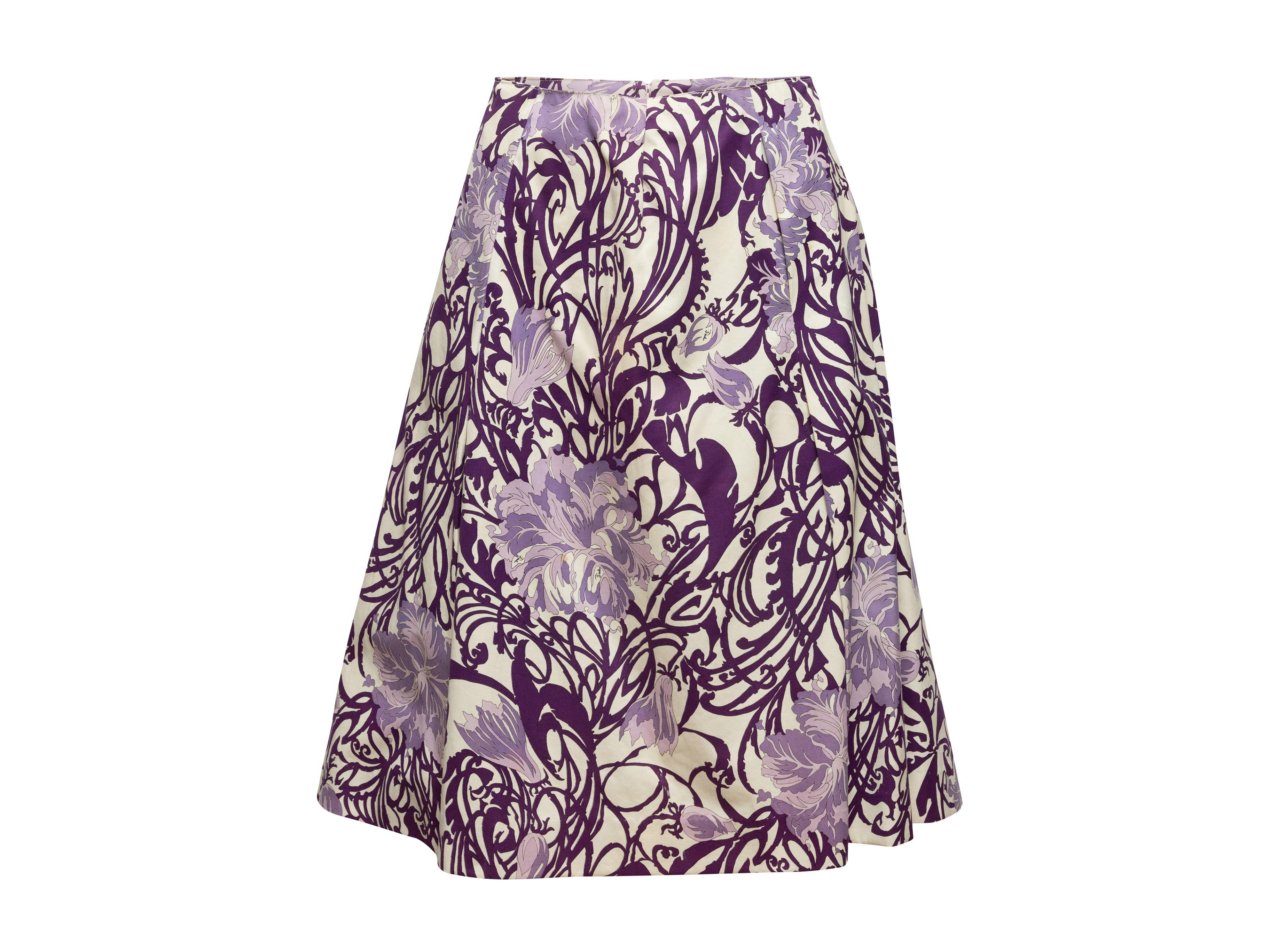 Product Details: Vintage purple and white floral print skirt by Emilio Pucci. Circa 1960s. Back zip closure. 30