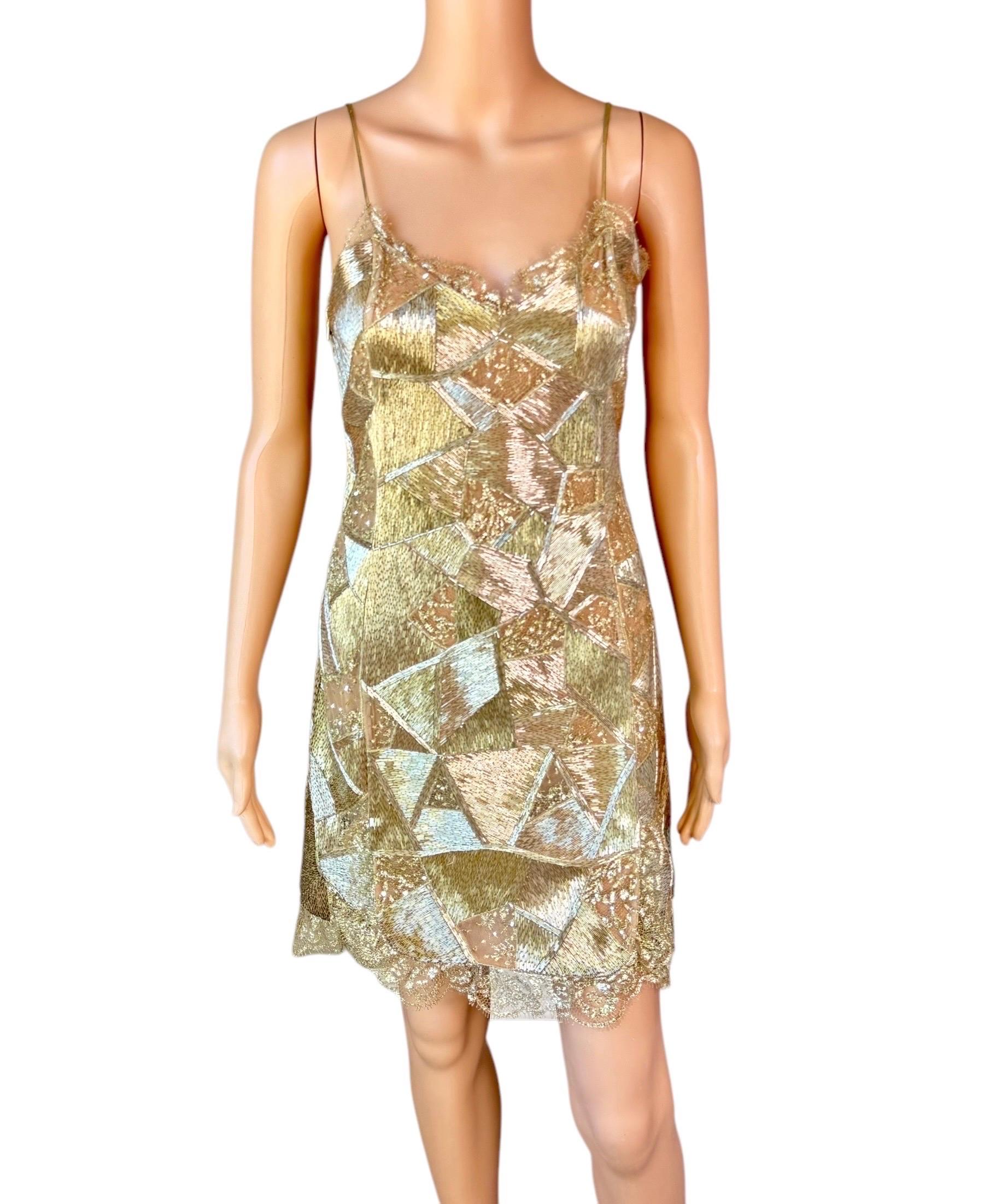 Emilio Pucci S/S 2012 Runway Unworn Embellished Sheer Lace Cutout Gold Mini Dress 

Look 31 from the Spring 2012 Collection by Peter Dundas.

Size: IT 40

Condition: Unworn with additional embellishments pouch attached, however there are some