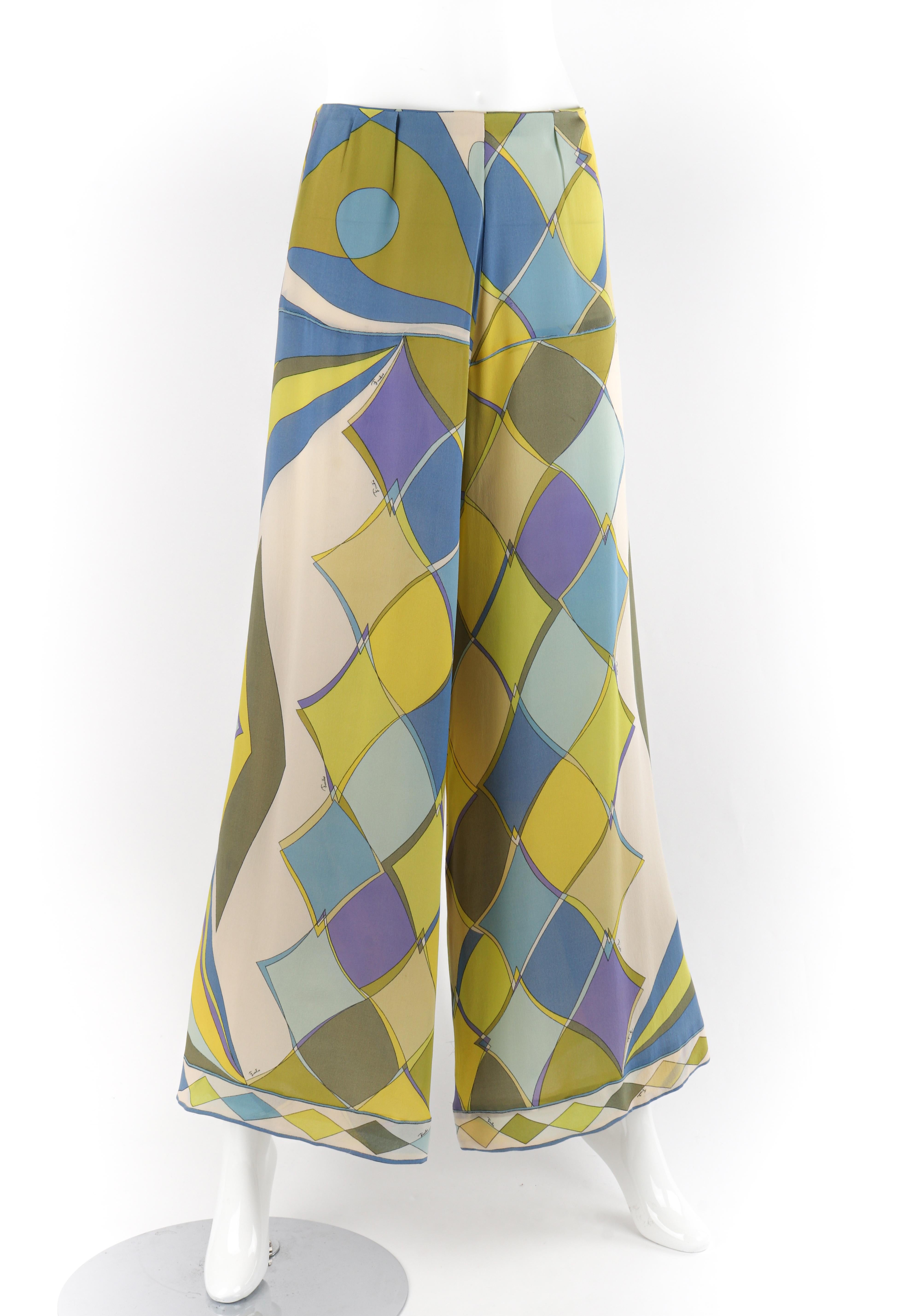 EMILIO PUCCI Saks Fifth Avenue c.1960's Blue Geometric Print Silk Wide Leg Pants
 
Brand / Manufacturer: Emilio Pucci
Circa: 1960's
Collection: “Exclusively for Saks Fifth Avenue”
Color(s): Shades of yellow, blue, green, and purple
Lined: Yes
Marked