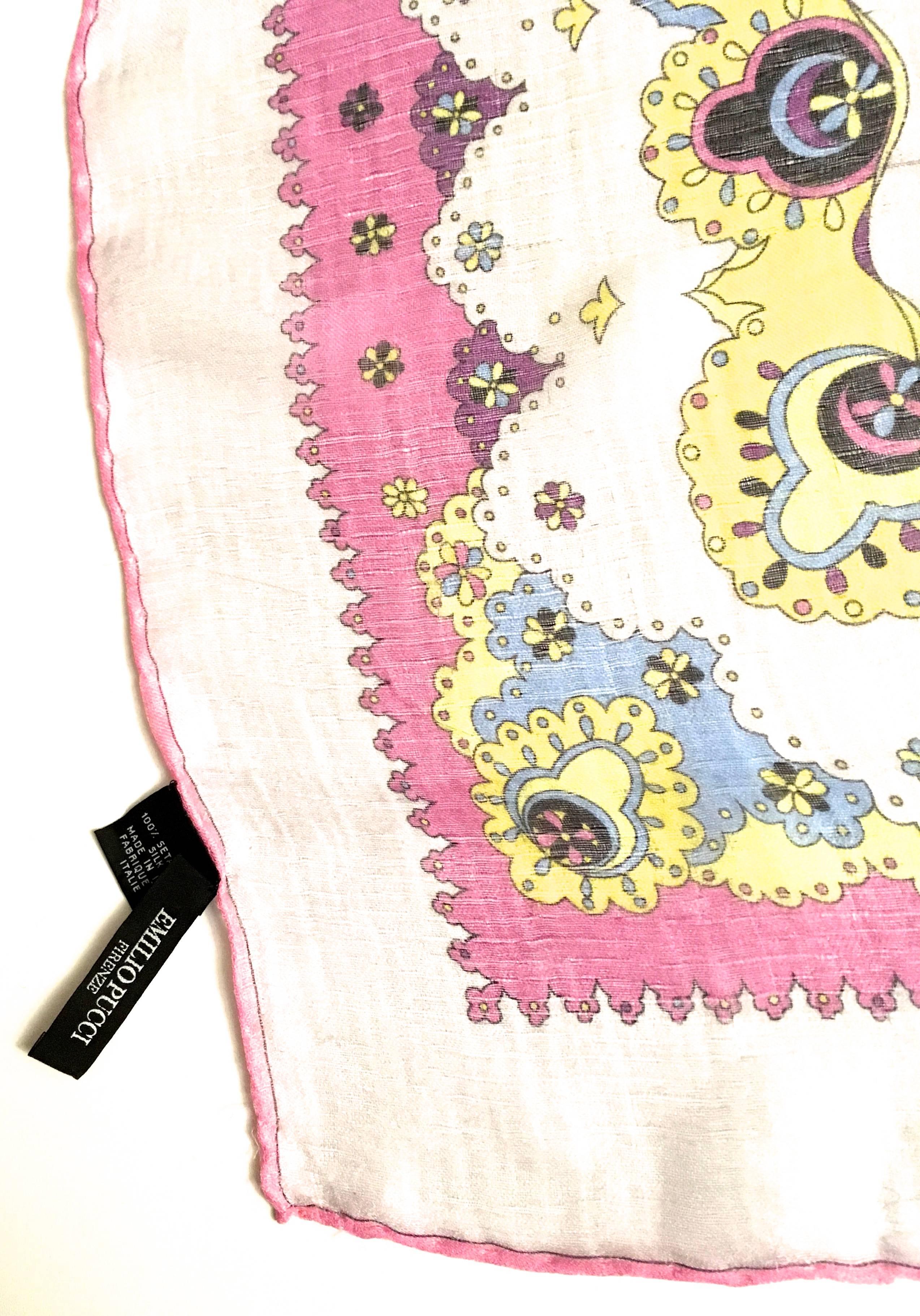 Presented here is a gorgeous Shawl/Scarf from Emilio Pucci.  This fabulous scarf is made from 100% silk muslin fabric that is ultra soft and comfortable to the touch. The scarf is hand rolled with a design in colors of black, yellow, green, white