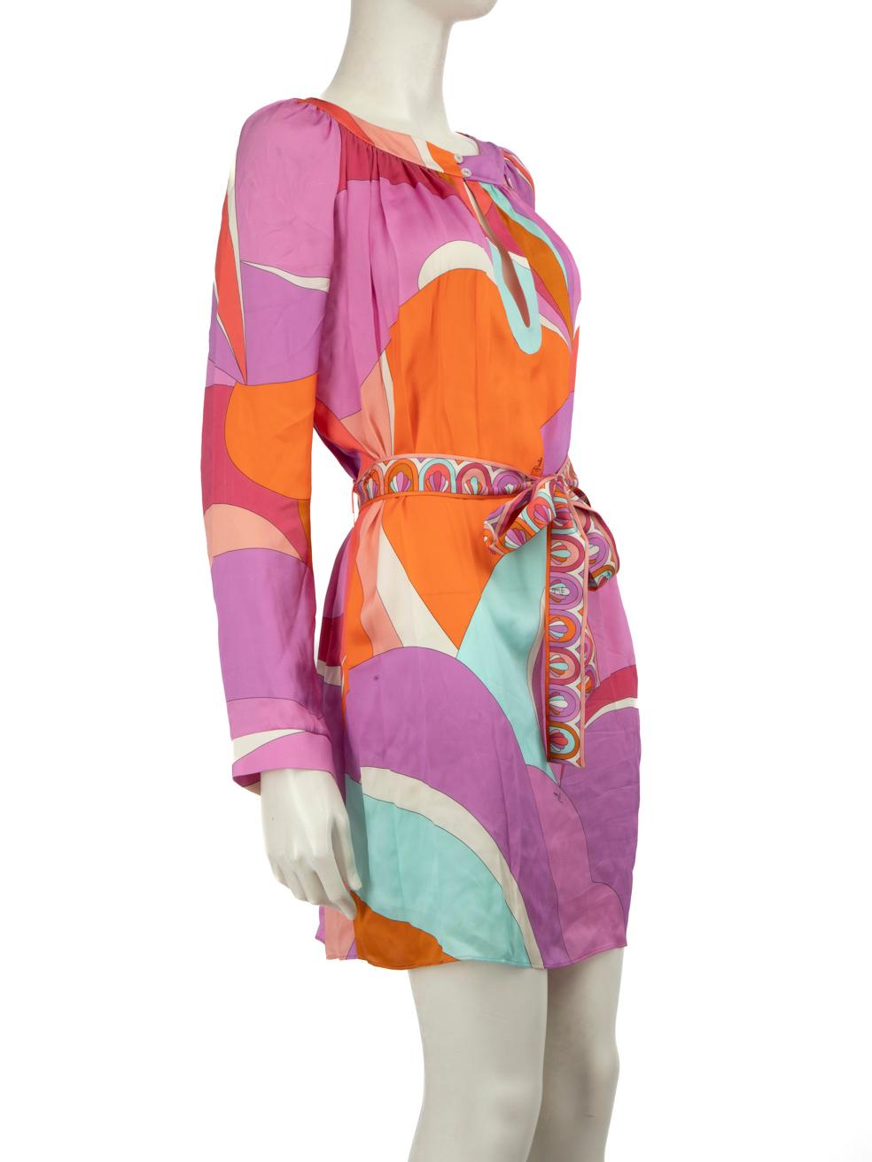 CONDITION is Very good. Minimal wear to the dress is evident, there is discolouration on the button loops and a small mark on the back of the dress near the hem. The back of the left arm and the back of the dress on the left side has some pulls to