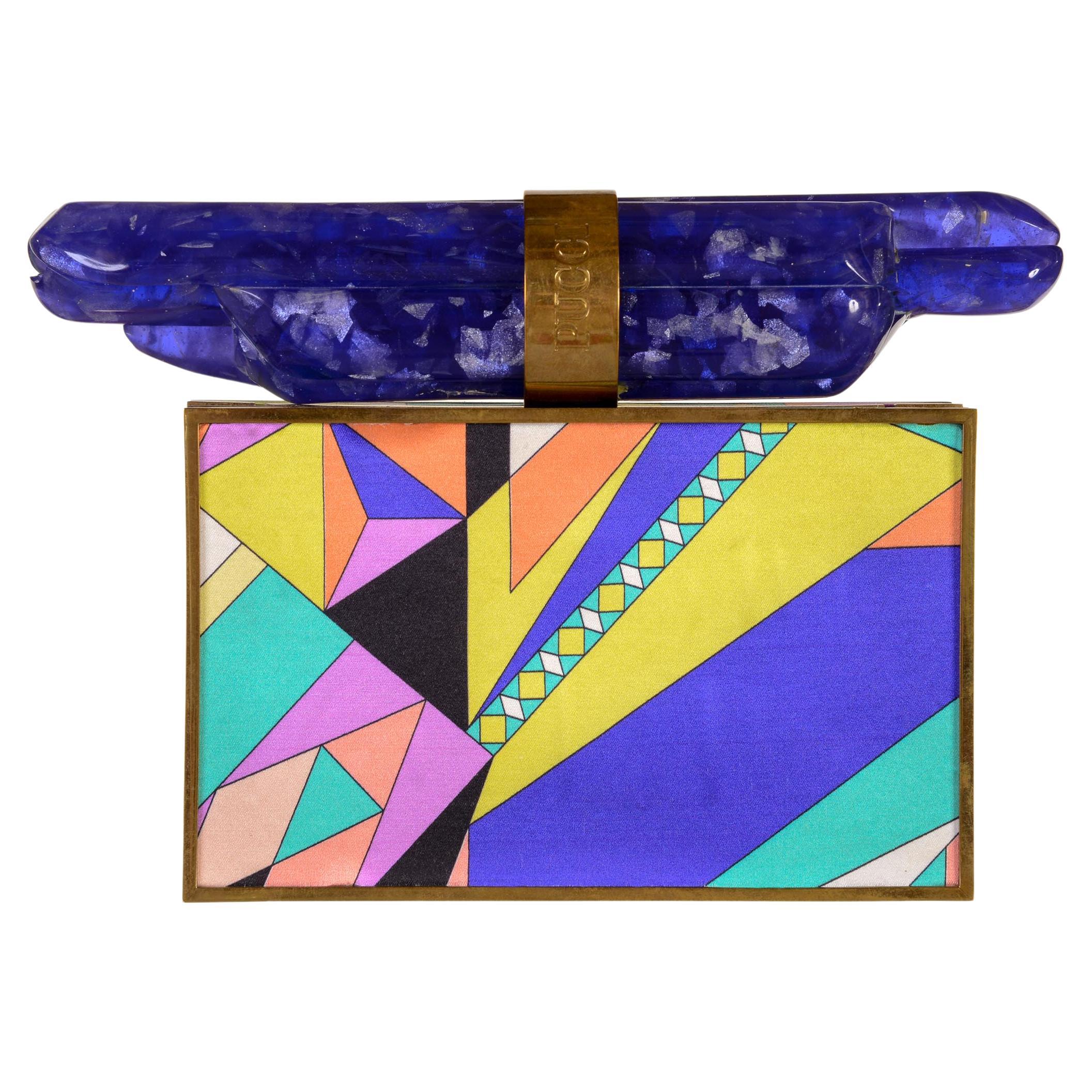 Emilio Pucci minaudière clutch  fall / winter 2008 collection
Clutch in golden metal with multicolored silk and large clasp in lapis lazuli  lucite with removable shoulder chain.
Measures:
width cm. 16
height cm. 10
depth cm. 3
weight gr. 547
Very