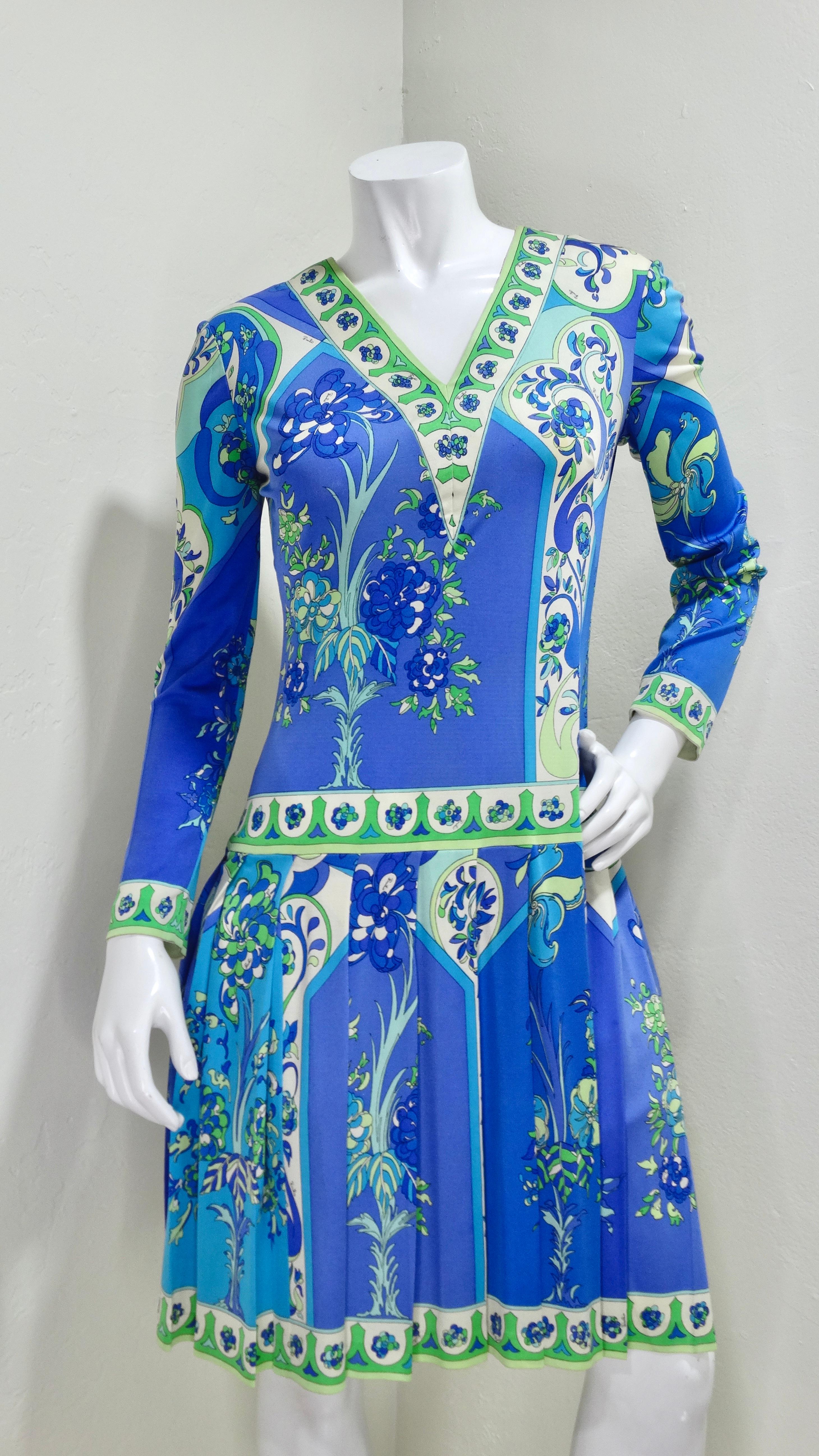 Don't miss out on the chance to get your hands on a a rare piece of Pucci. Look closely at the details like pleating on the bottom half and the smart use of pattern-blocking to give the illusion of a two-piece outfit. Features a full zip back and