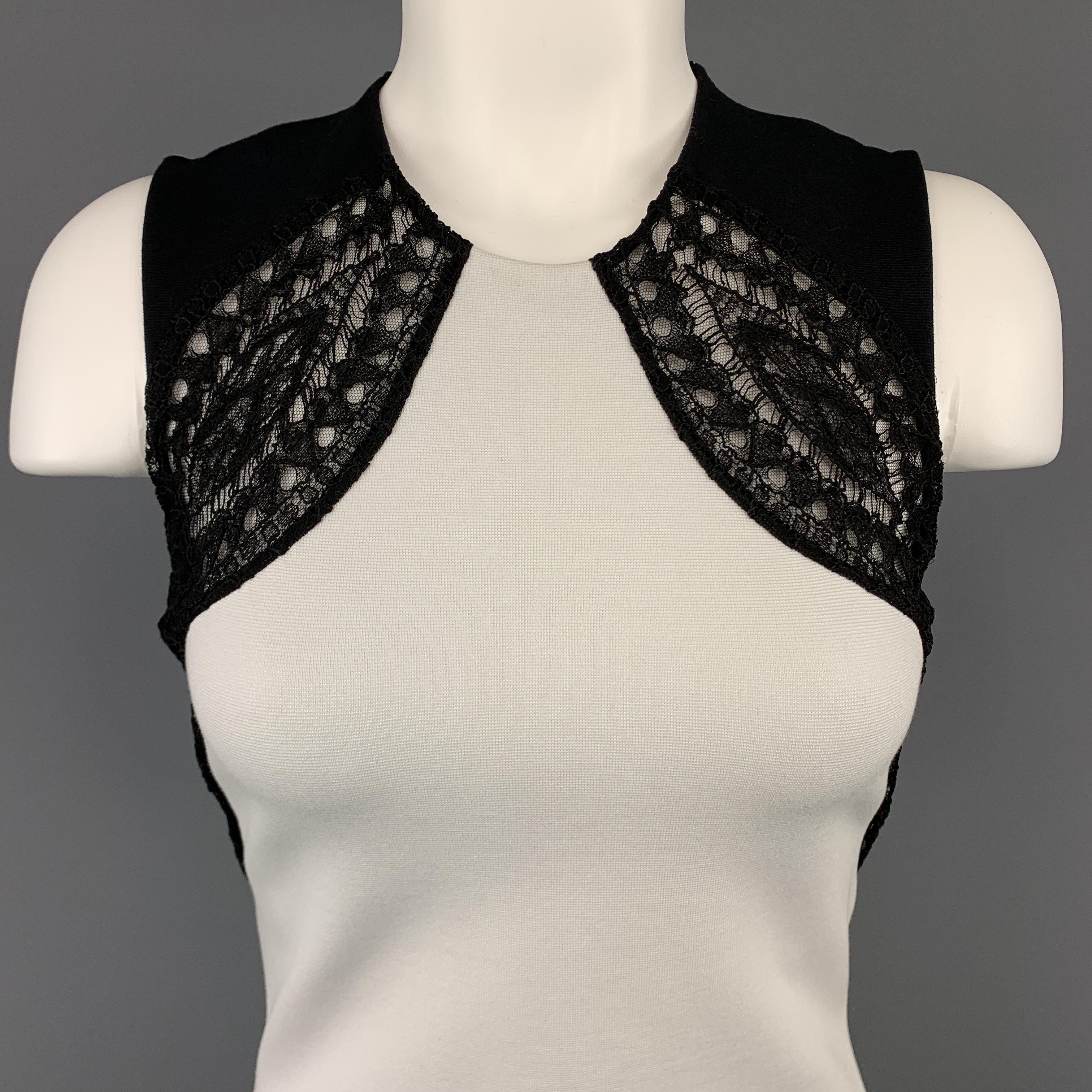 EMILIO PUCCI mini sheath dress comes in white stretch knit with a round neckline and black lace accented top. Made in Italy.

Excellent Pre-Owned Condition.
Marked: 4

Measurements:

Shoulder: 12 in.
Bust: 32 in.
Waist: 27 in.
Hip: 33 in.
Length: