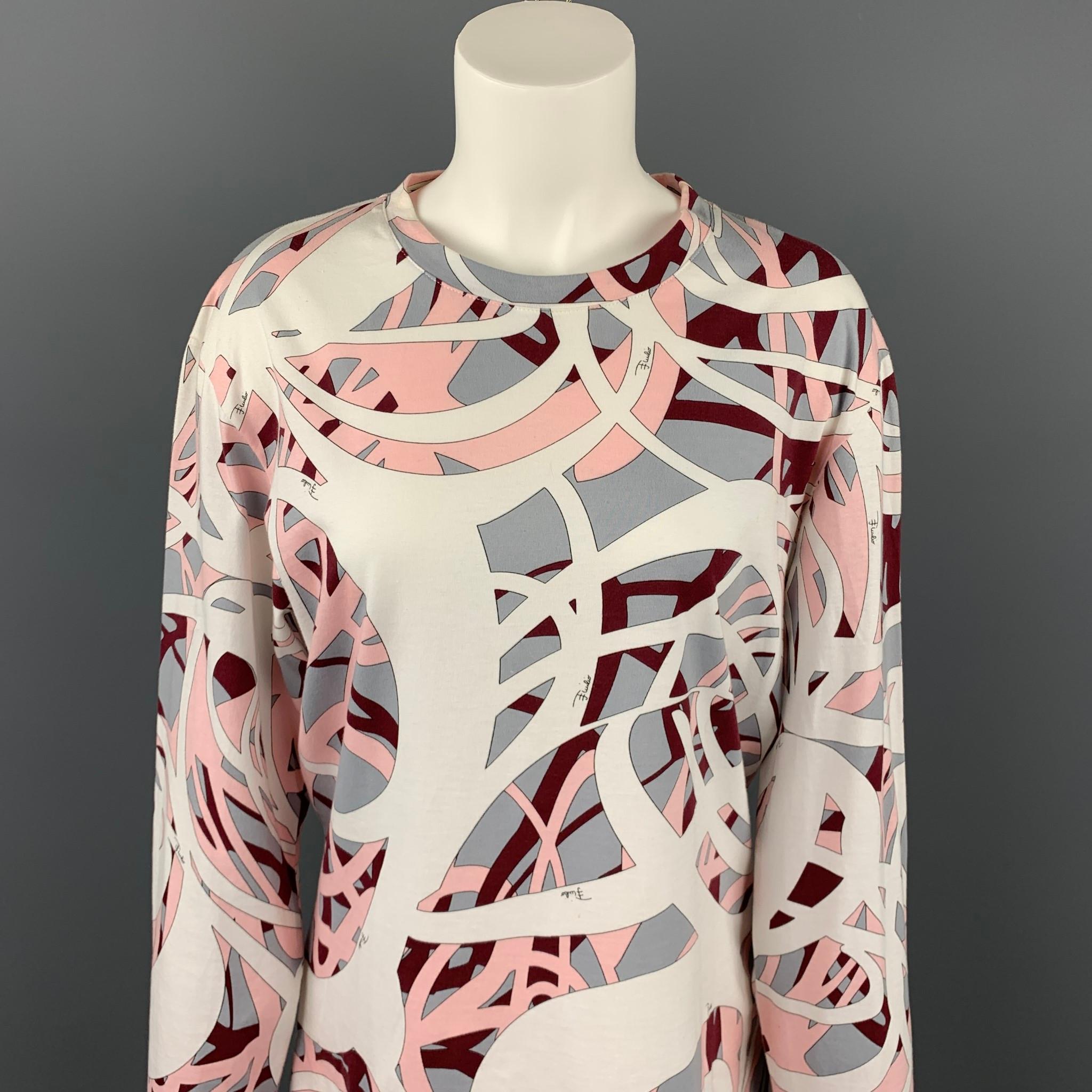 EMILIO PUCCI long sleeve t-shirt comes in a multi-color print cotton featuring a crew-neck. Moderate discoloration. Made in Italy.

Good Pre-Owned Condition.
Marked: L

Measurements:

Shoulder: 19 in. 
Bust: 42 in. 
Sleeve: 26.5 in. 
Length: 26 in. 