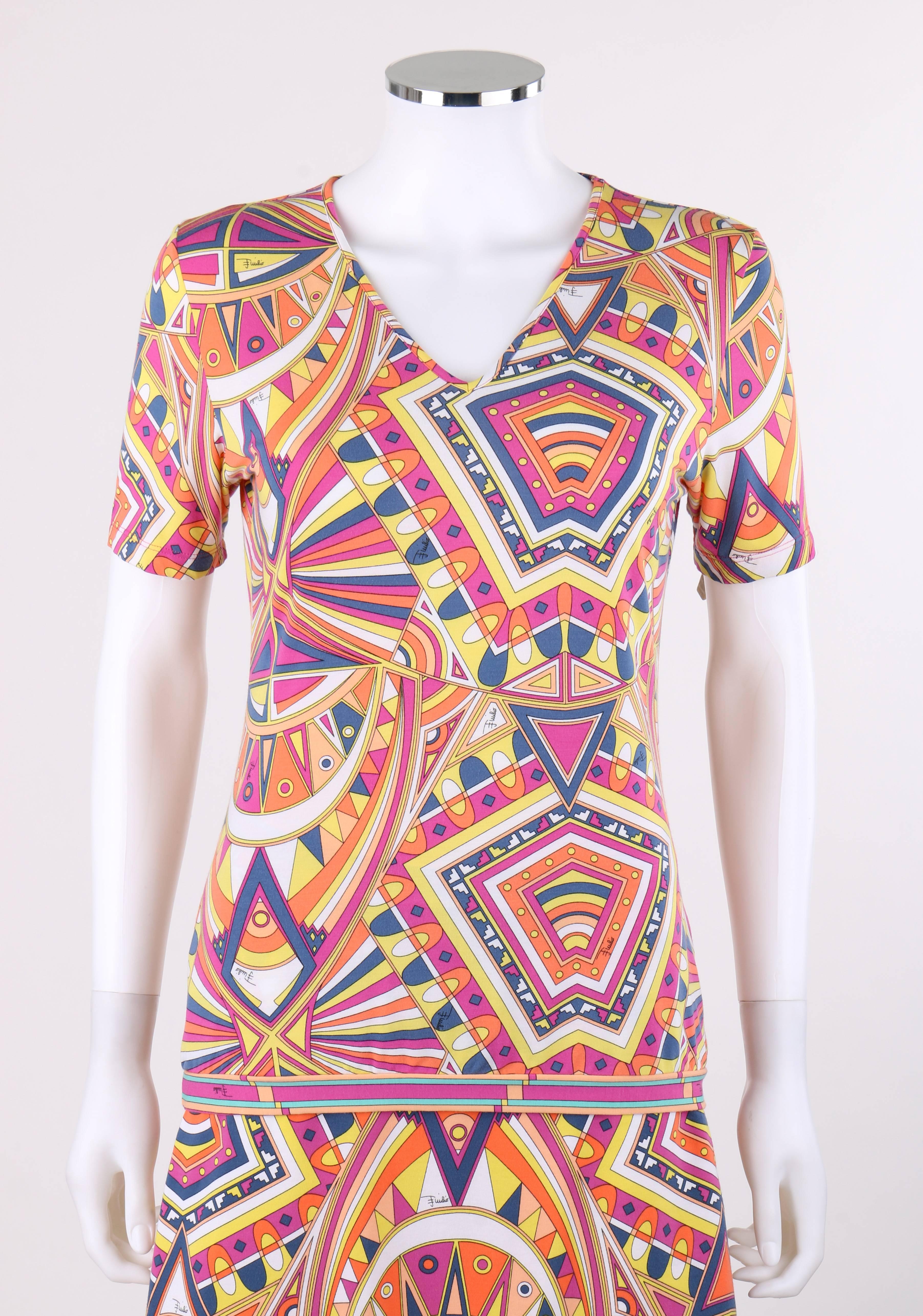 Emilio Pucci Spring / Summer 2009 two piece kaleidoscope signature print jersey knit v-neck top mini skirt set. Designed by Matthew Williamson. Bright multicolor kaleidoscope tribal signature print jersey knit in shades of orange, yellow, peach,