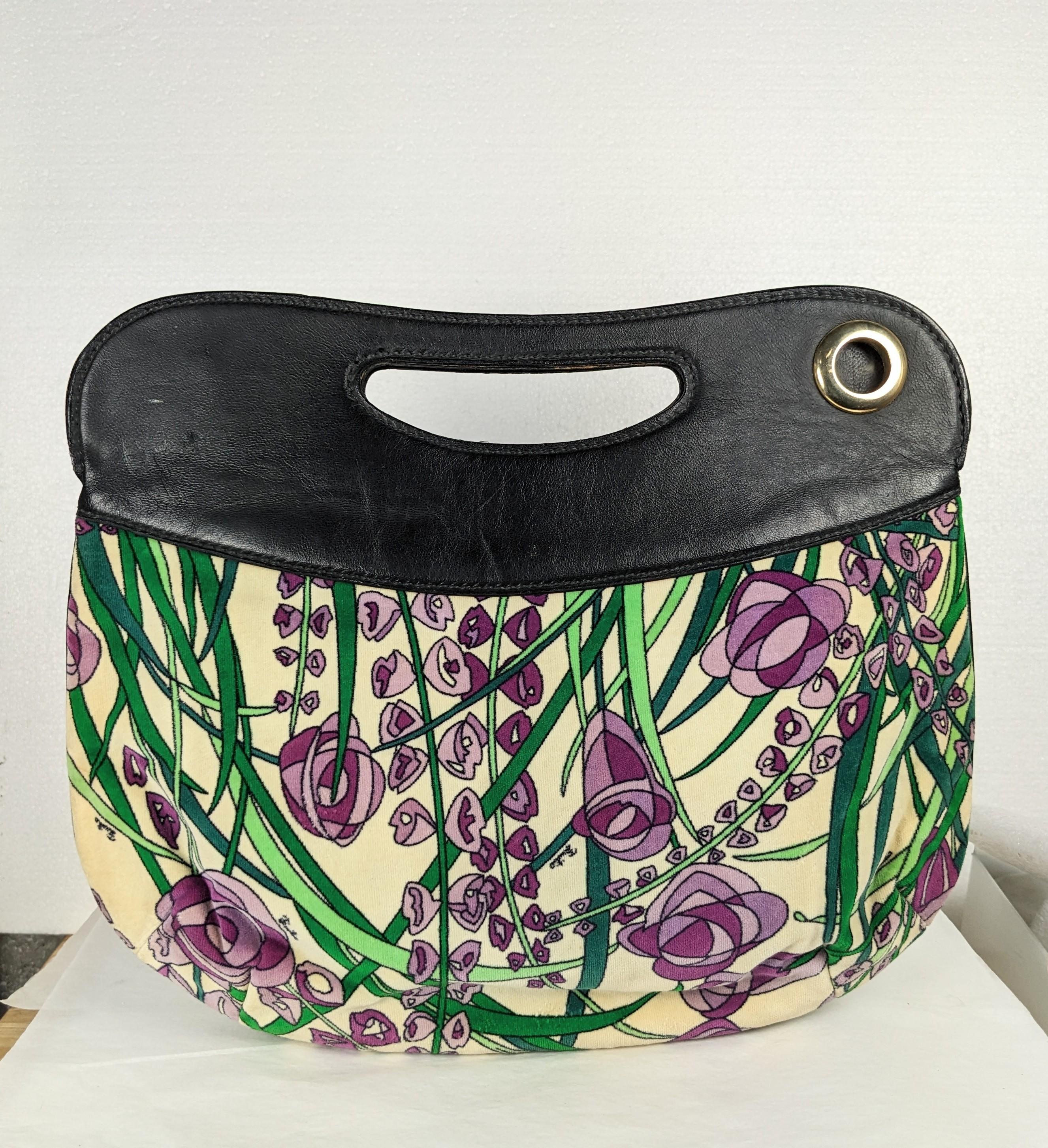 Unusual Emilio Pucci Transformable Top Handle Clutch from the 1970's with a detachable shoulder strap. Calf leather with handle cut out in signature printed logo velvet base. Large easy size with leather lining and zipper closure. 1970's Italy. 14