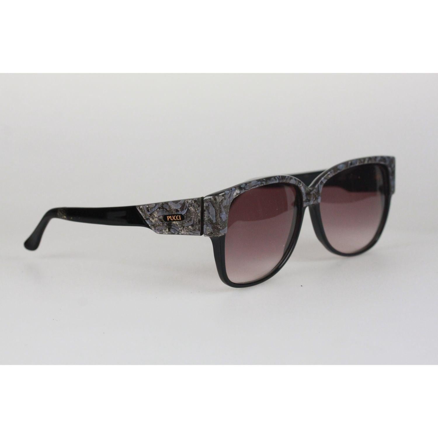 Elegant and Stylish Vintage EMILIO PUCCI Sunglasses Black Acetate frame with Marbled effect - finish on the top. Hand Made in France. Grey Gradient 100% UV lens. New Old Stock - Never Worn. Details MATERIAL: Plastic COLOR: Black MODEL: EP75 GENDER:
