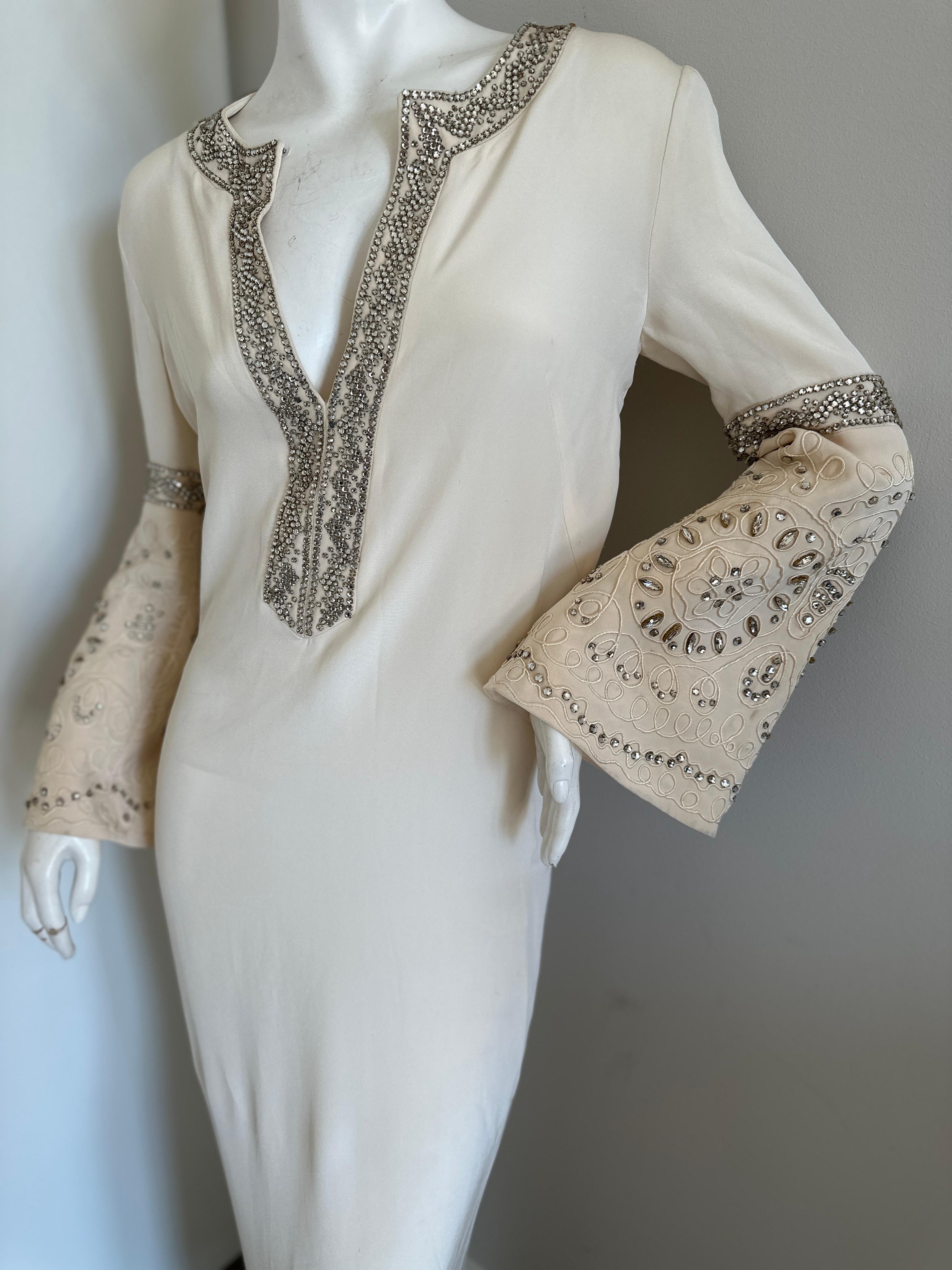 Emilio Pucci Vintage Ivory Silk Caftan Style Dress with Crystal & Beaded Details. The bell sleeves are a different fabric and a little more tan than ivory.
This is so cool, please use the zoom feature to see the details. 
Perfect for Ibiza or