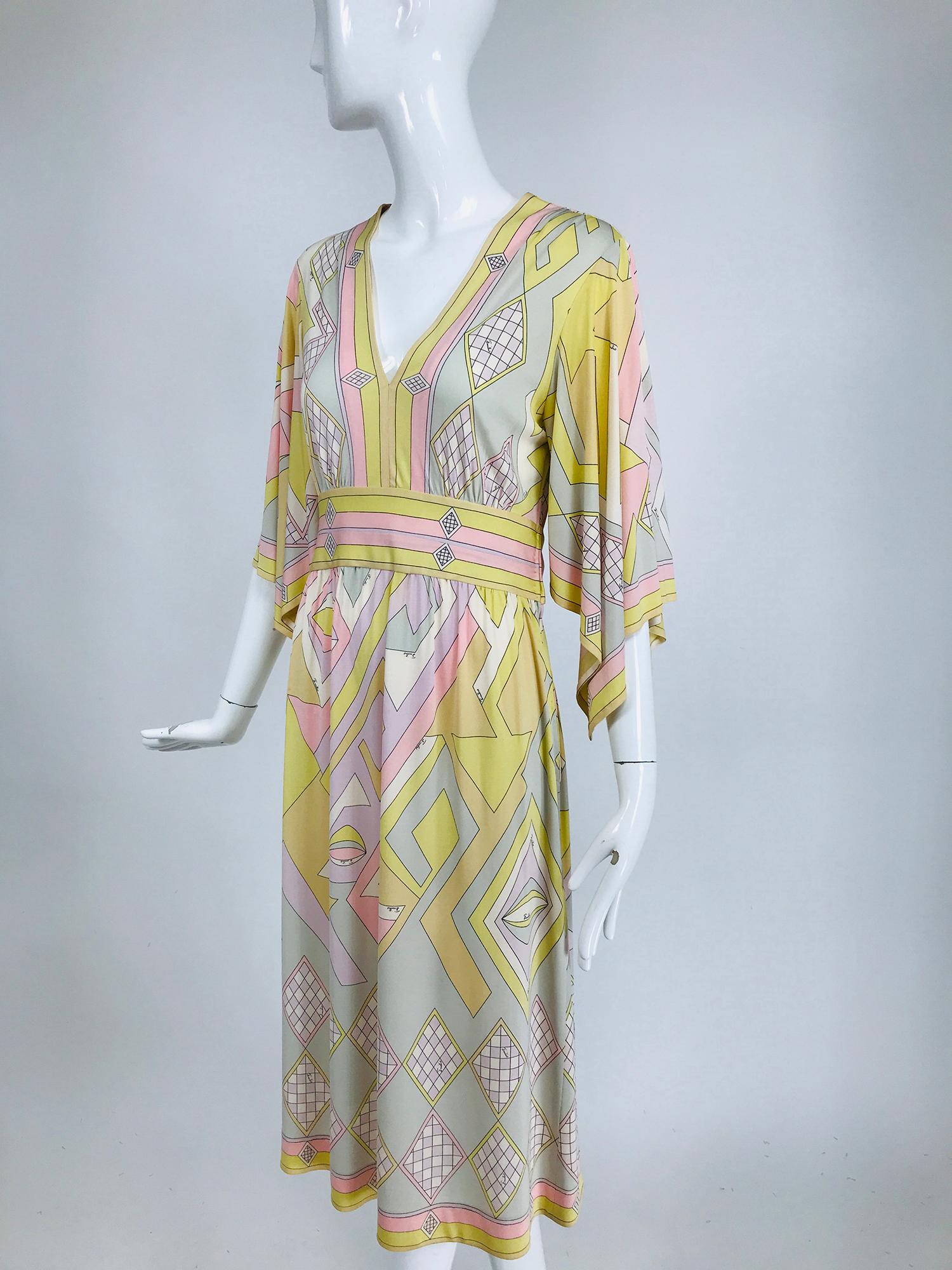 Emilio Pucci vintage silk v neck kimono sleeve day dress. Gorgeous soft colours in a geometric design. Pull on dress has a deep v front, the kimono sleeves are square and elbow length and open from the under arm seam to edge of sleeve end. A curved