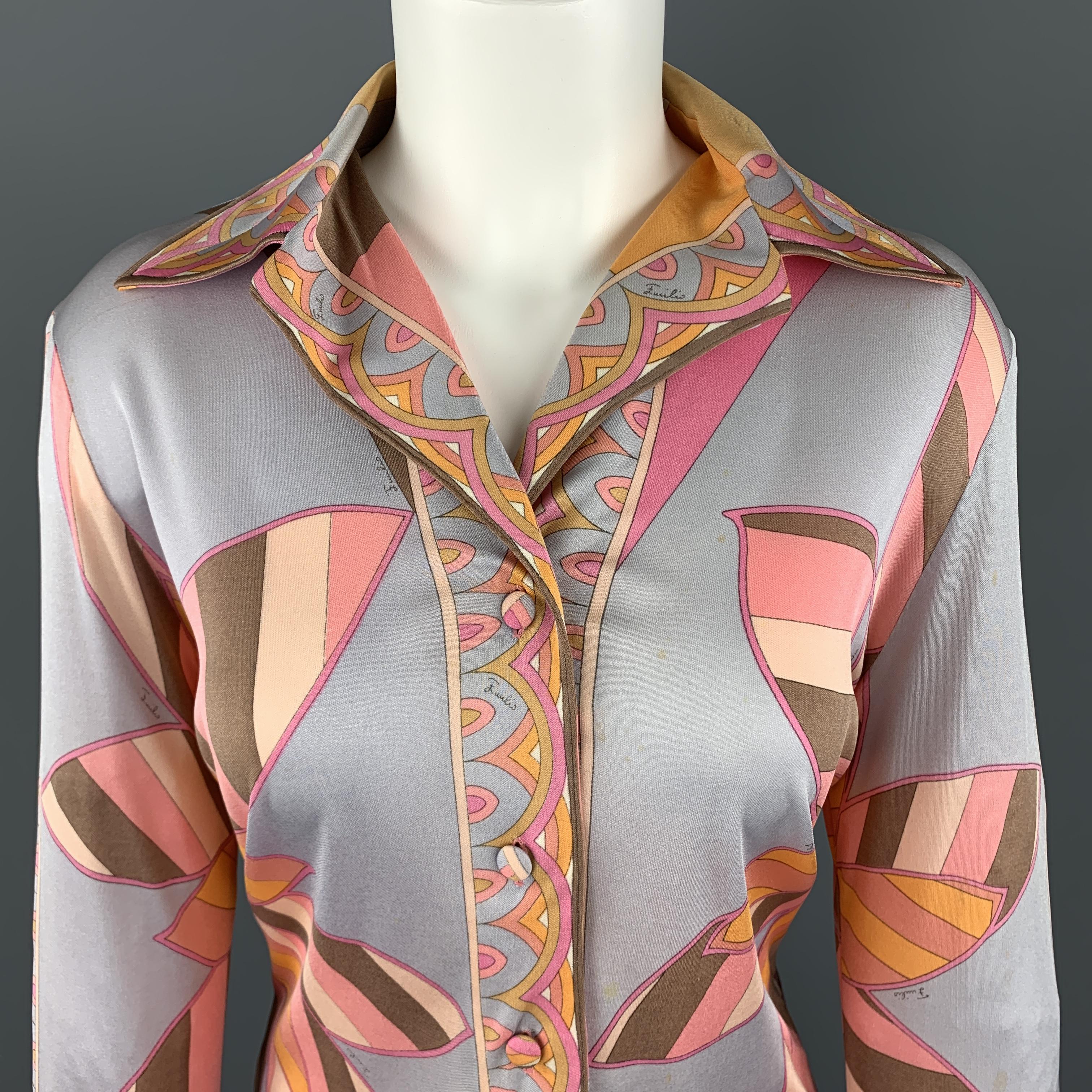 Vintage EMILIO PUCCI blouse comes in a silk blend jersey with an all over pink and gray floral print and spread collar. Wa=ear and spots throughout. As-is. ade in Italy.

Fair Pre-Owned Condition.
Marked: 10

Measurements:

Shoulder: 17 in.
Bust: 40