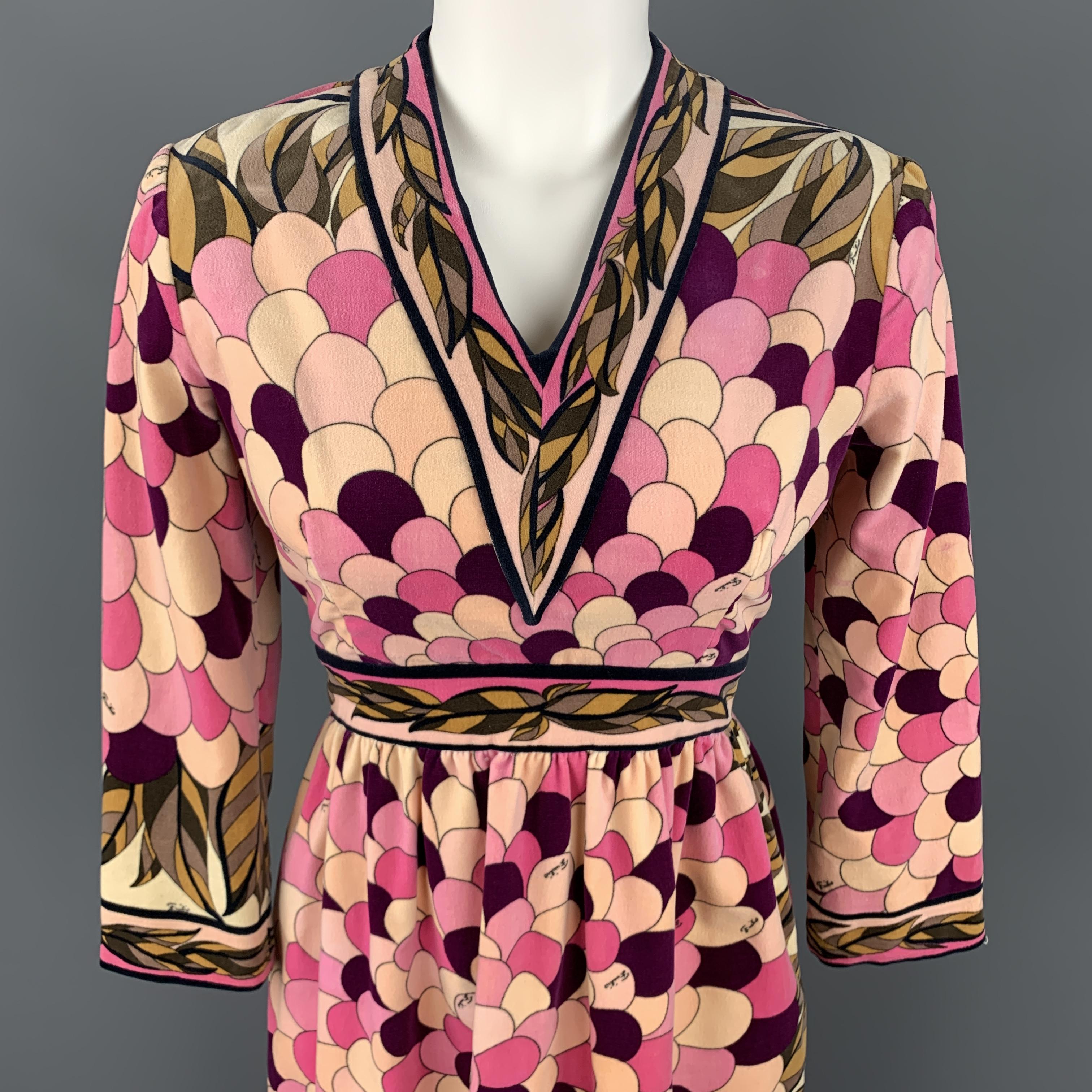 Vintage EMILIO PUCCI dress comes in light pink velvet with an all over purple and brown print, v neck, cropped long sleeve, and A ling skirt. Made in Italy.

Good Pre-Owned Condition.
Marked: 10

Measurements:

Shoulder: 16 in.
Bust: 36 in.
Waist: