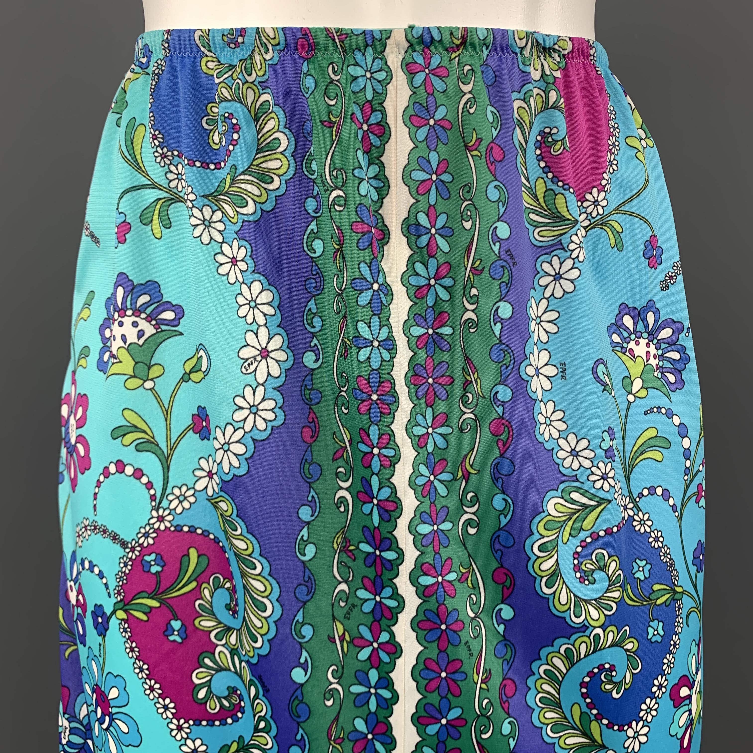 Vintage EMILIO PUCCI for FORMFIT ROGERS slip skirt comes in blue jersey with an all over floral print. Made in USA.

Very Good Pre-Owned Condition.
Marked: (no size)

Measurements:

Waist: 23 in.
Hip: 37 in.
Length: 19 in.