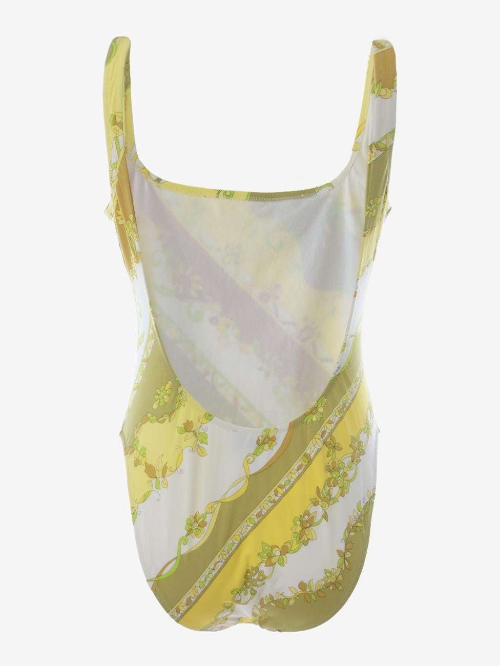 Emilio Pucci Vintage Swimwear is a one-piece swimsuit with a wide opening at the back, featuring Pucci's iconic pattern. Size 46.

CONDITION
Very good vintage condition
Small stains on the epaulette
(see the guide below)

LABEL
Emilio Pucci - Made