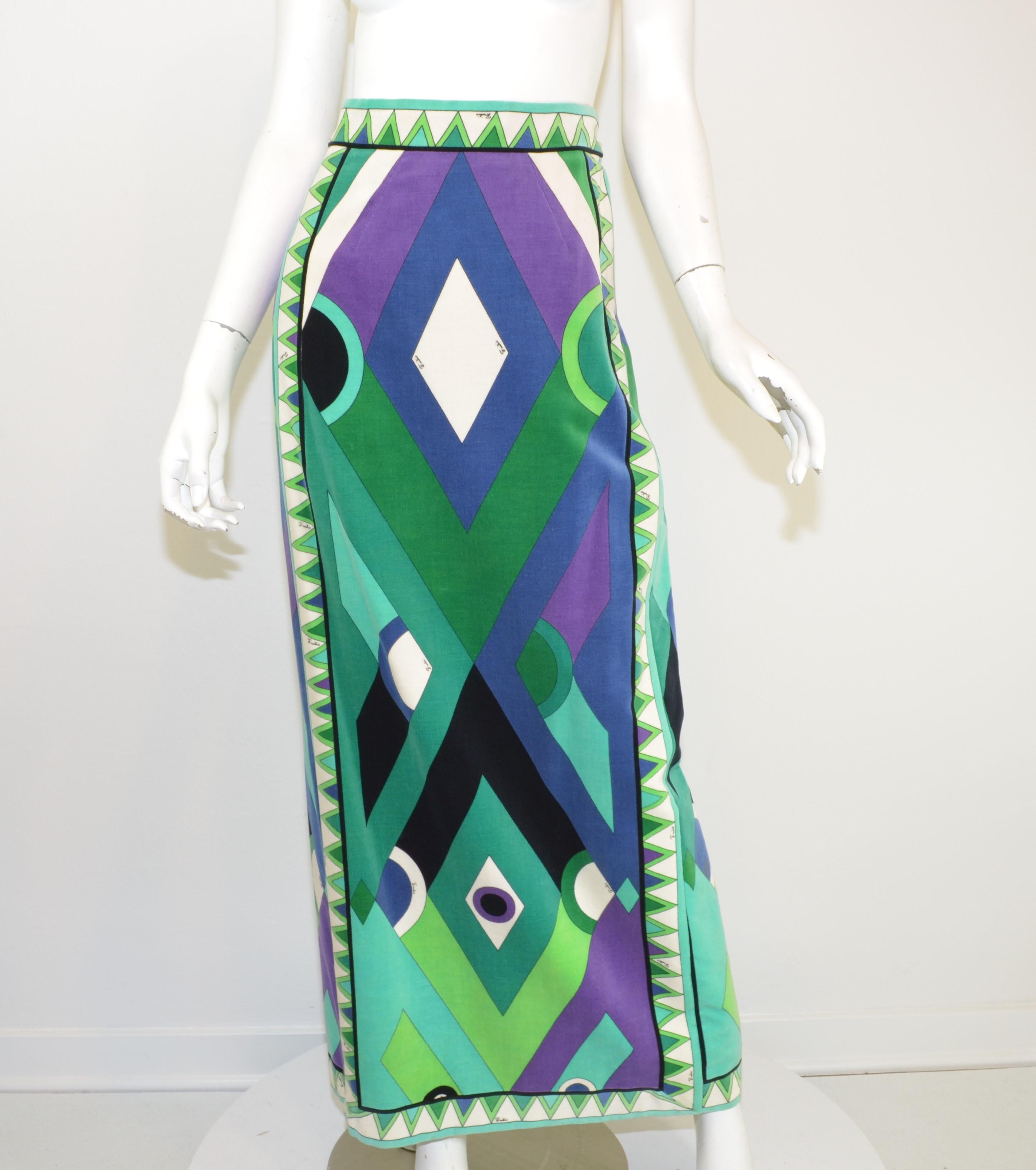 Vintage Emilio Pucci skirt is featured in a vibrant, multicolored geometric print on a velvet material. Skirt is lined and has a side zipper and snap button fastening. Labeled size 12, made in Italy.

Measurements:
Waist 26”
Hips 36”
Length 43”