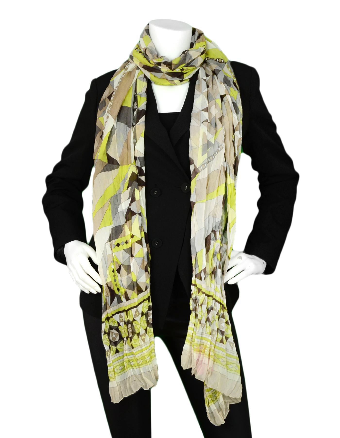 Emilio Pucci Yellow & Grey Silk Crinkled Scarf

Color: Yellow, grey 
Materials: Silk (missing composition tag)
Overall Condition: Excellent pre-owned condition, with the exception of missing composition tag
Measurements: 
93