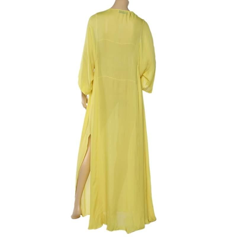 This kaftan maxi dress from Emilio Pucci is vibrant and gorgeous! It is tailored from quality silk and designed with wide sleeves, a tie to the neckline, and a slit to the side.

Includes: Brand tag
