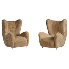 Chaises longues de taille Emilio Sarrachi, en bois et peau de mouton, Italie, années 1940