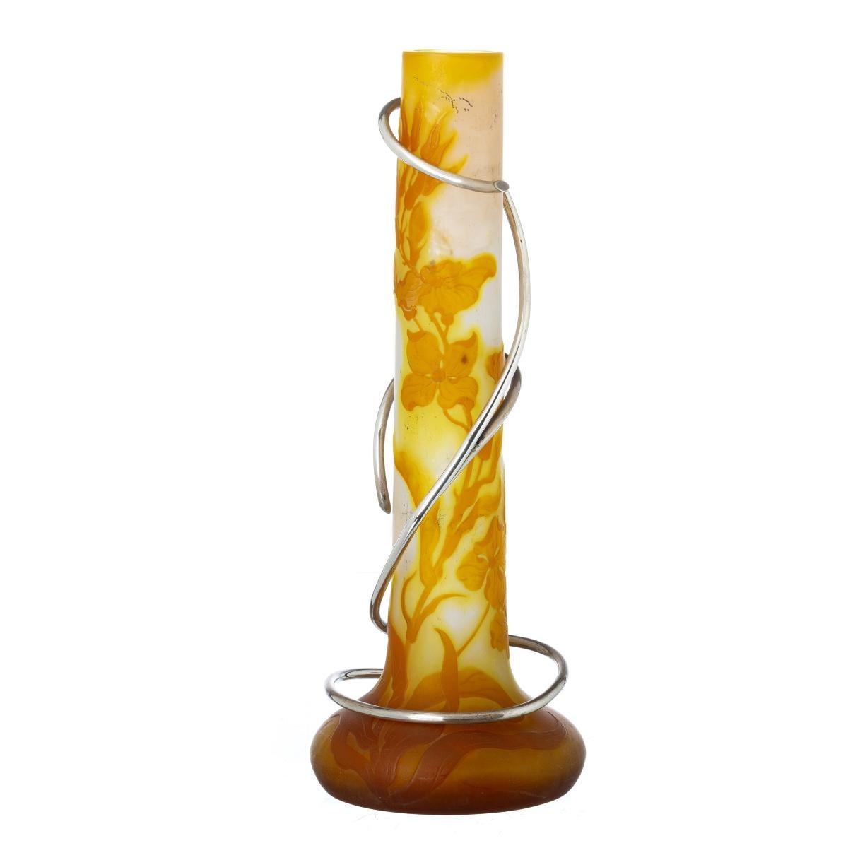 This elegant Émile Gallé vase, crafted in France during the height of the Art Nouveau movement, represents the refined artistry and innovation of one of the most celebrated glassmakers of the late 19th and early 20th centuries. Made in glass paste,