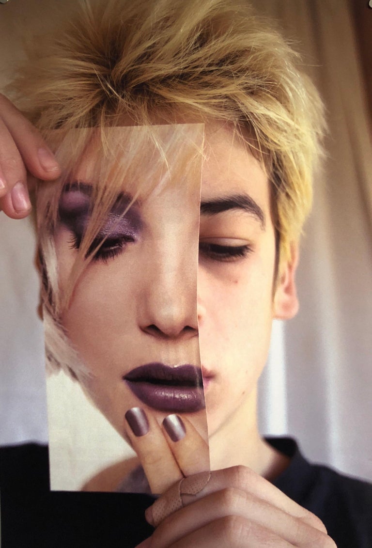 This was from Muse X publishers. It came in a plastic bag signed Emily Cheng. (the plastic bag is not included) It is on Fuji crystal photo paper. It depicts two Asian faces in a cubist, fractured way, with a woman (or man) holding a photograph over