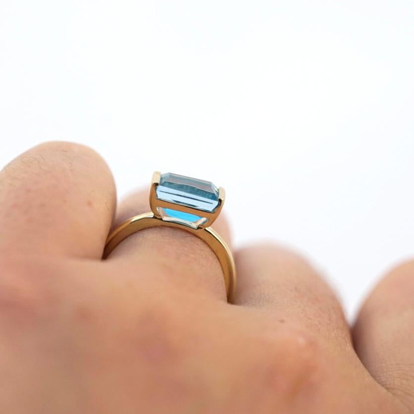 Emerald Cut Emily Kuvin Blue Topaz and 14 Karat Yellow Gold Ring For Sale