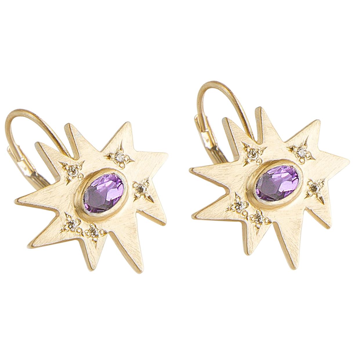 The perfect drop for any occasion. Our iconic matte gold organic shape Stellina star is affixed to a lever back hook. Featuring our signature diamond dusting and stunning amethyst centers, these earrings are full of sparkle.

KAPOW! The Stella