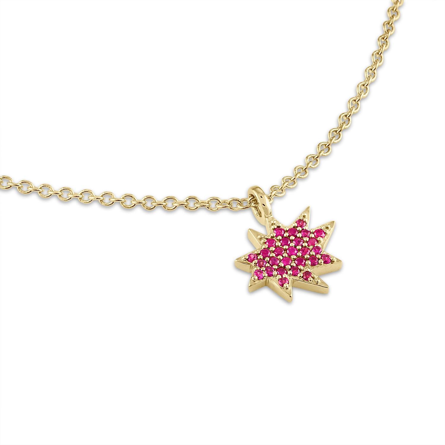 Elegant and adorable! Our Mini Stella Necklace is the perfect piece to layer or wear alone. Our iconic 14k gold organic star in a new delicate size hangs on a 14k gold chain and sparkles with a gorgeous little carpet of rubies. 

KAPOW! The Stella