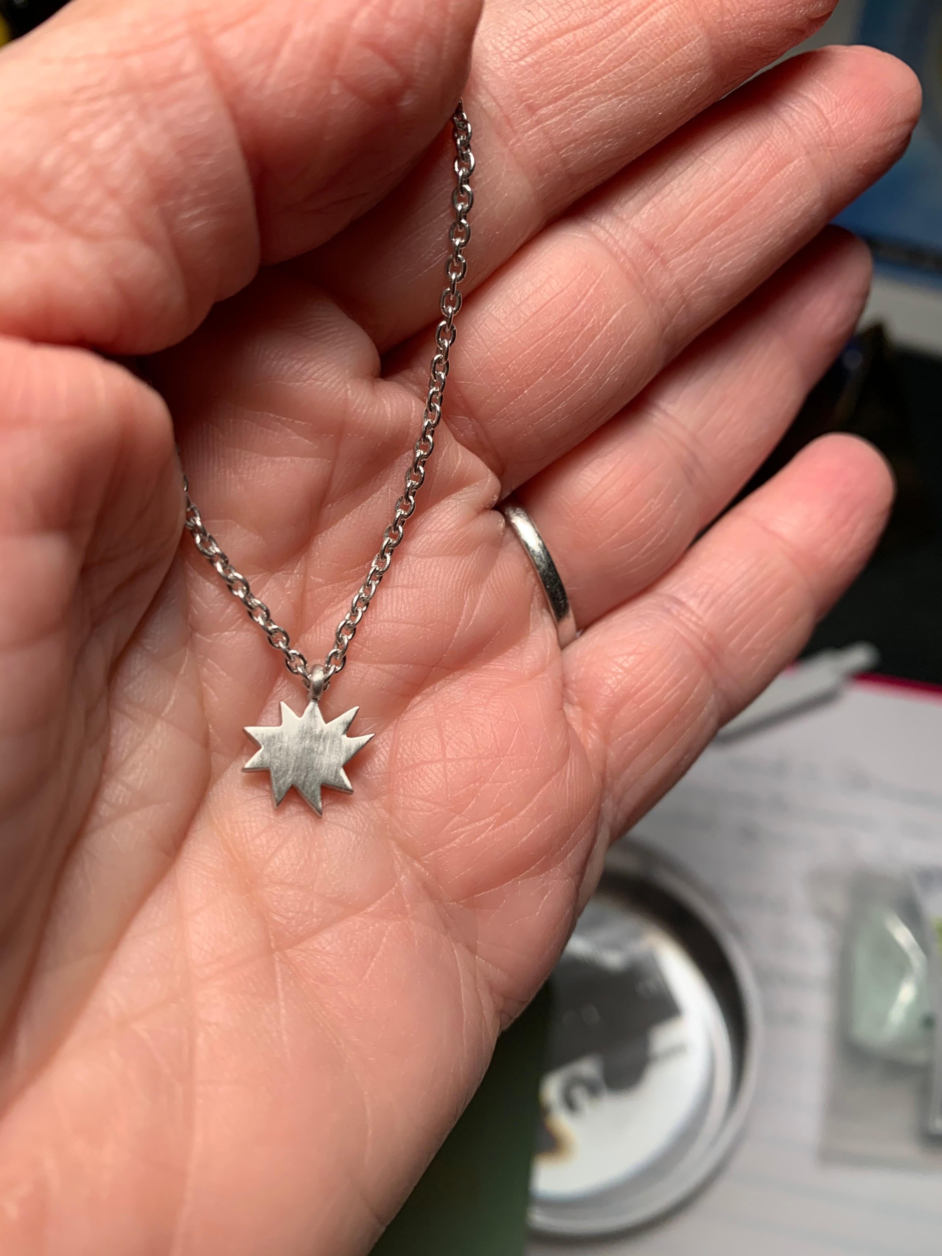 Elegant and adorable! Our Mini Stella Necklace is the perfect piece to layer or wear alone. Our iconic organic star in a new delicate size hangs on a sterling silver chain and brings some KAPOW! to all who wear it. Wear one or several!

KAPOW! The