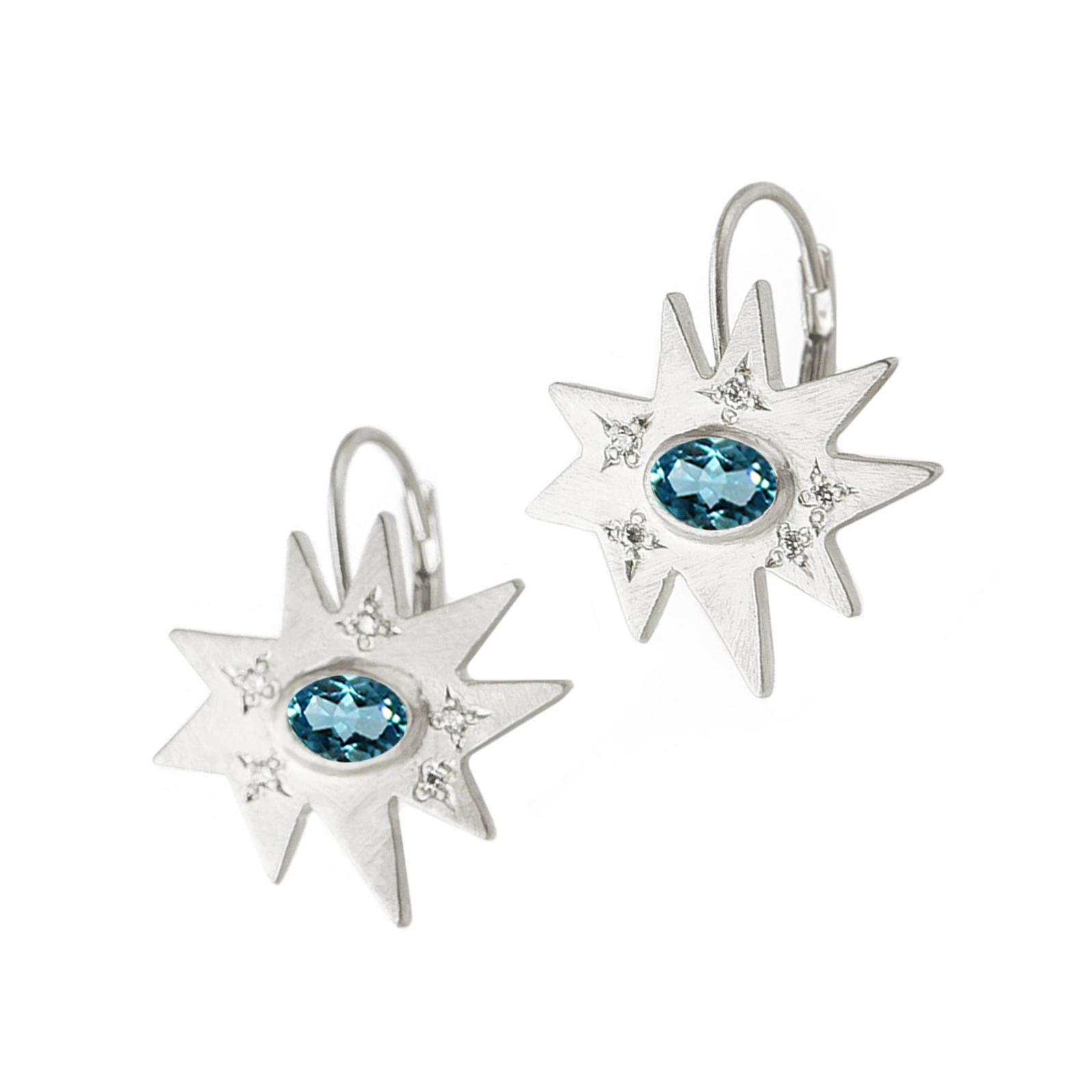 The perfect drop for any occasion. Our iconic matte sterling silver Stellina star is fixed to a lever back hook. Featuring our signature diamond dusting and a vibrant Swiss blue topaz center, this pair is full of sparkle and color.
 
Matte sterling