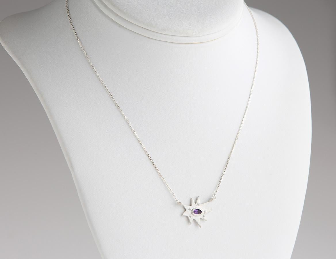 Classic and stunning. Our iconic matte silver Stellina necklace features our signature diamond dusting and a vibrant amethyst center. Hanging on a delicate chain, this piece is made to accent any outfit, and layers perfectly. 

This spectacular line