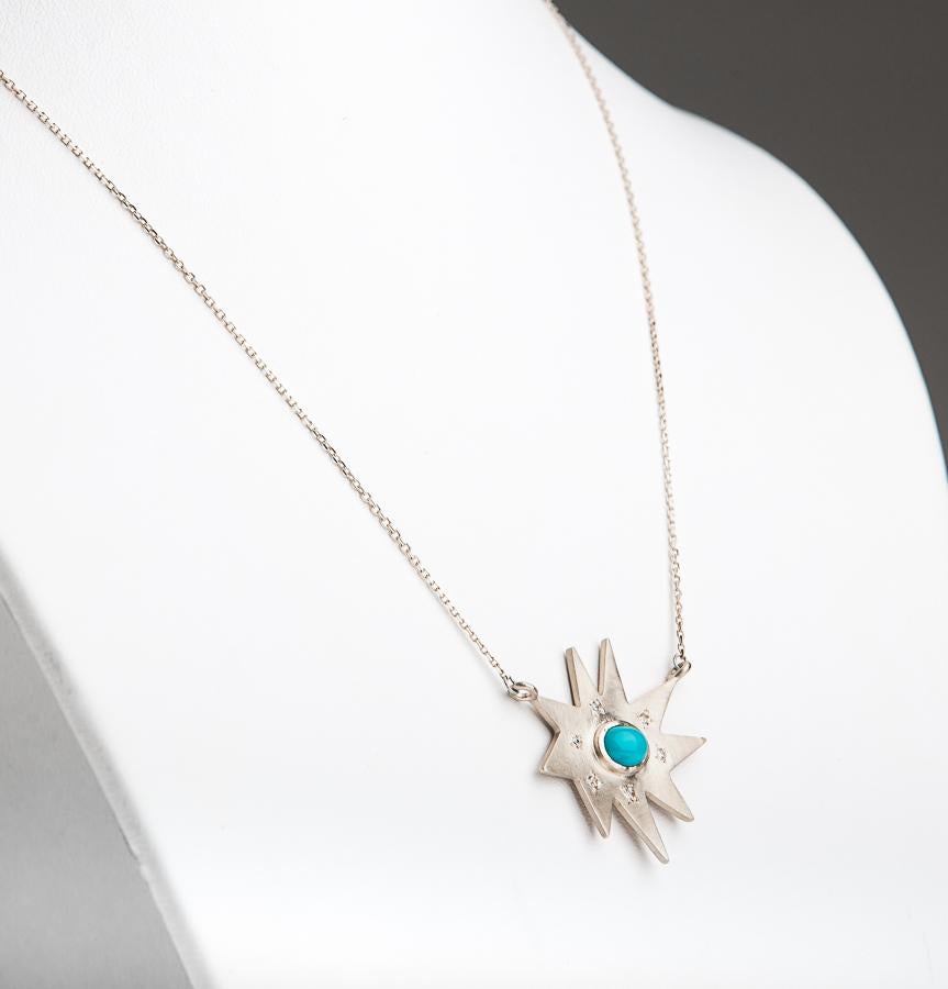 Classic and stunning. Our iconic matte silver Stella necklace features our signature diamond dusting and a gorgeous turquoise center. Hanging on a substantial chain, this colorful piece is luxe and weighty. 

This spectacular line is based on