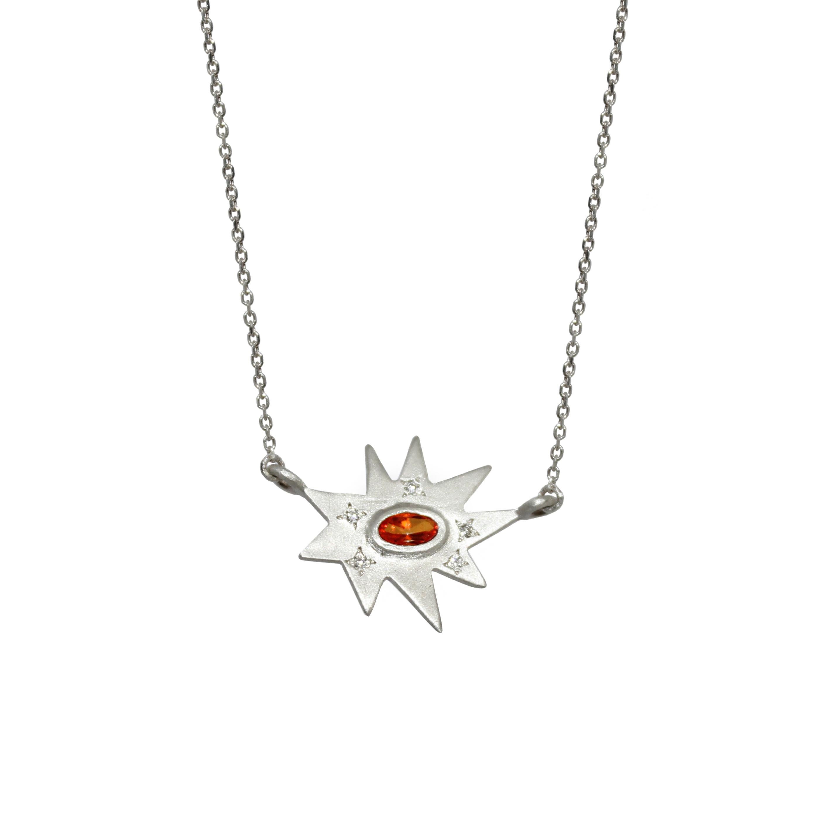 Classic and stunning. Our iconic matte silver Stellina necklace features our signature diamond dusting and a vibrant poppy passion topaz center. Hanging on a delicate chain, this piece is made to accent any outfit, and layers perfectly. 

This