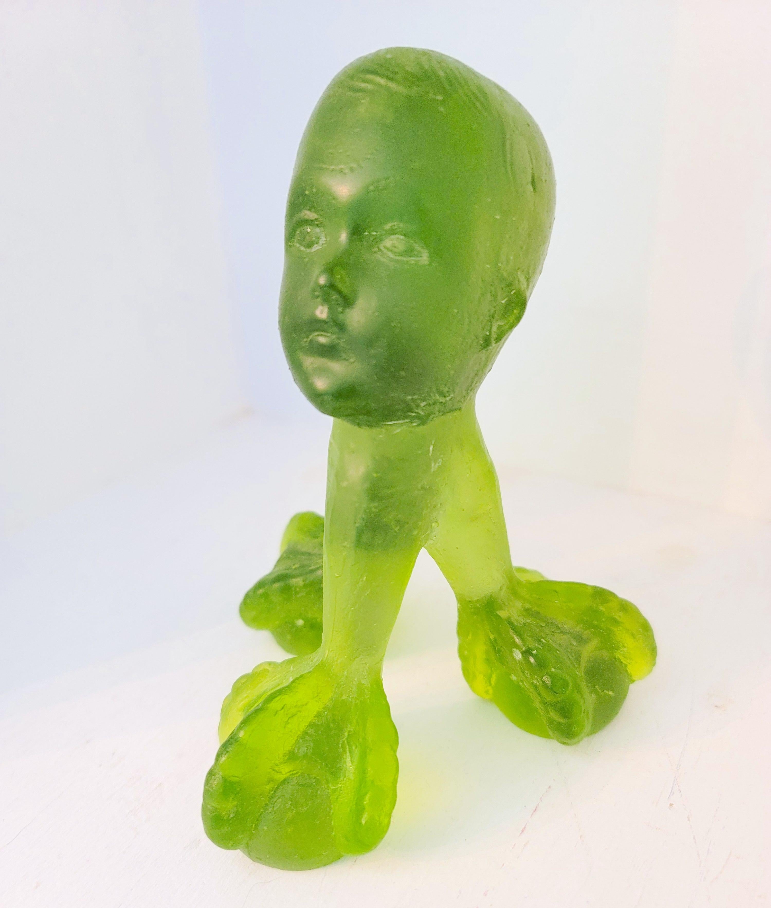Baby Face on Claw Foot Base: green glass sculpture, surrealism / pop art child - Sculpture by Emily Selvin