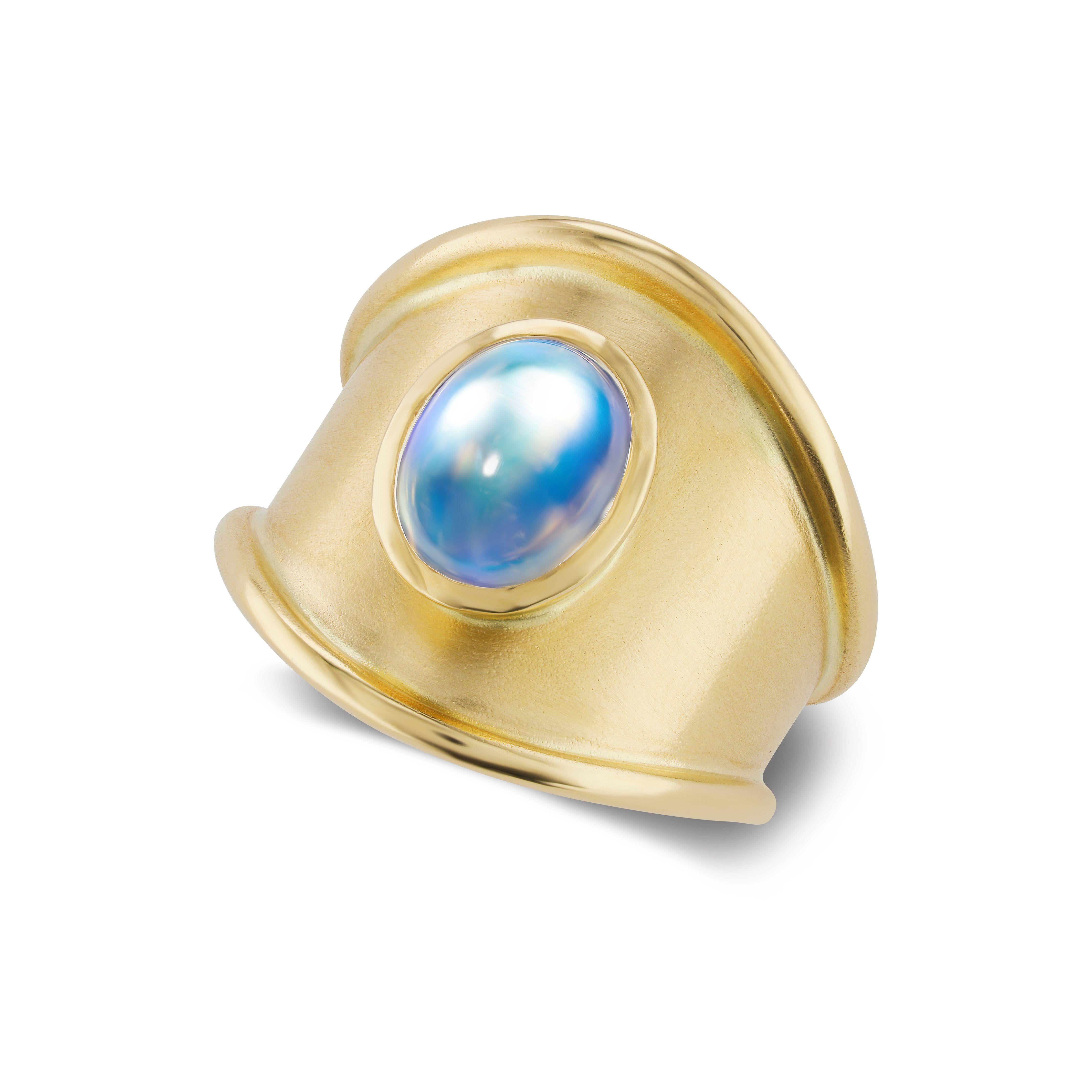 The Castle Roads Ring features a billowy blue moonstone set into a pool of lustrous 18k yellow gold.

 The Ancient Romans believed moonstones were formed from frozen beams of moonlight, and would bestow love, wisdom and good fortune on those who