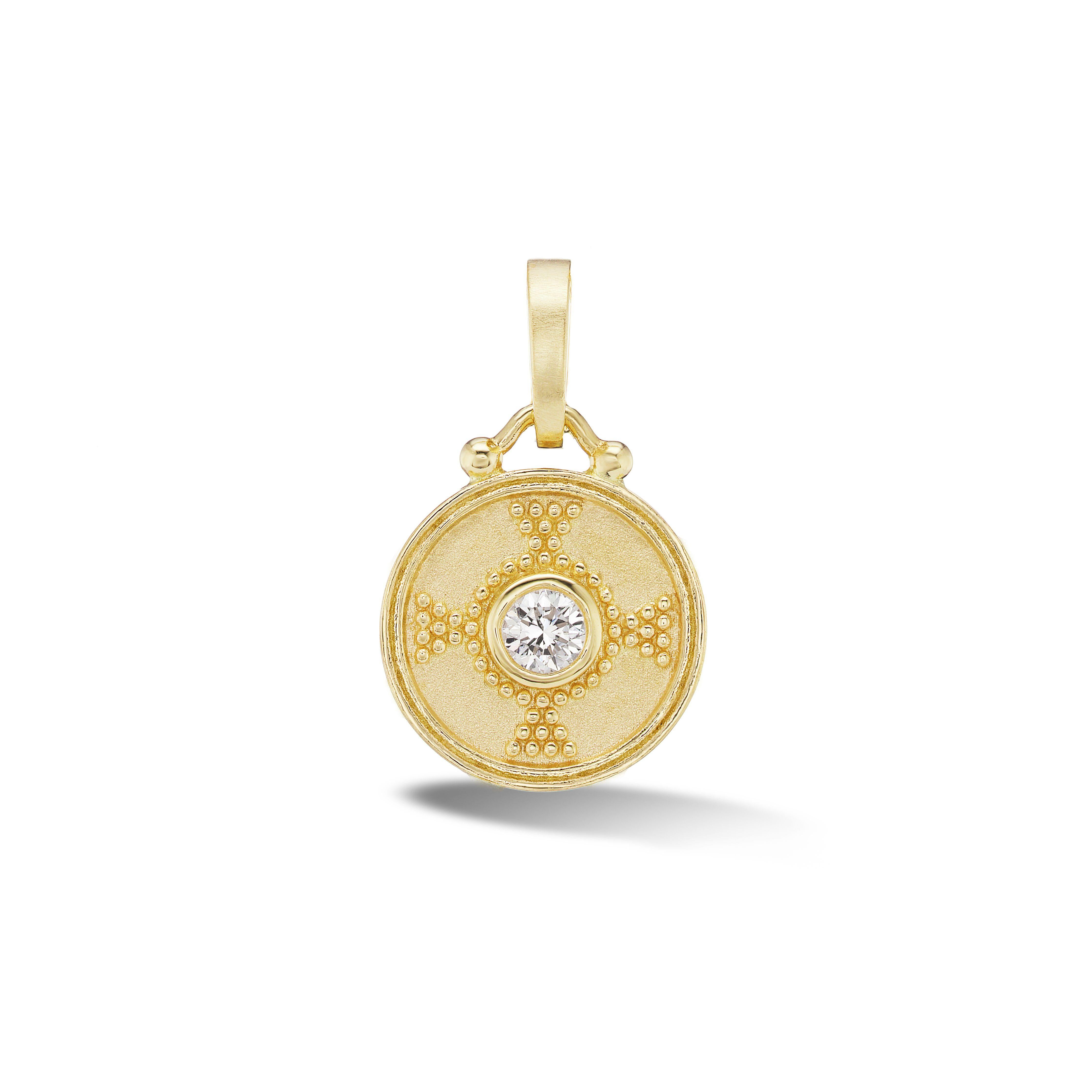 Drawn from antiquity, this charm is named for the Latin word for granulation, an ancient technique where the surface of a jewel is decorated with small golden spheres. This charm features a diamond framed by a granulated pyramid pattern, and is