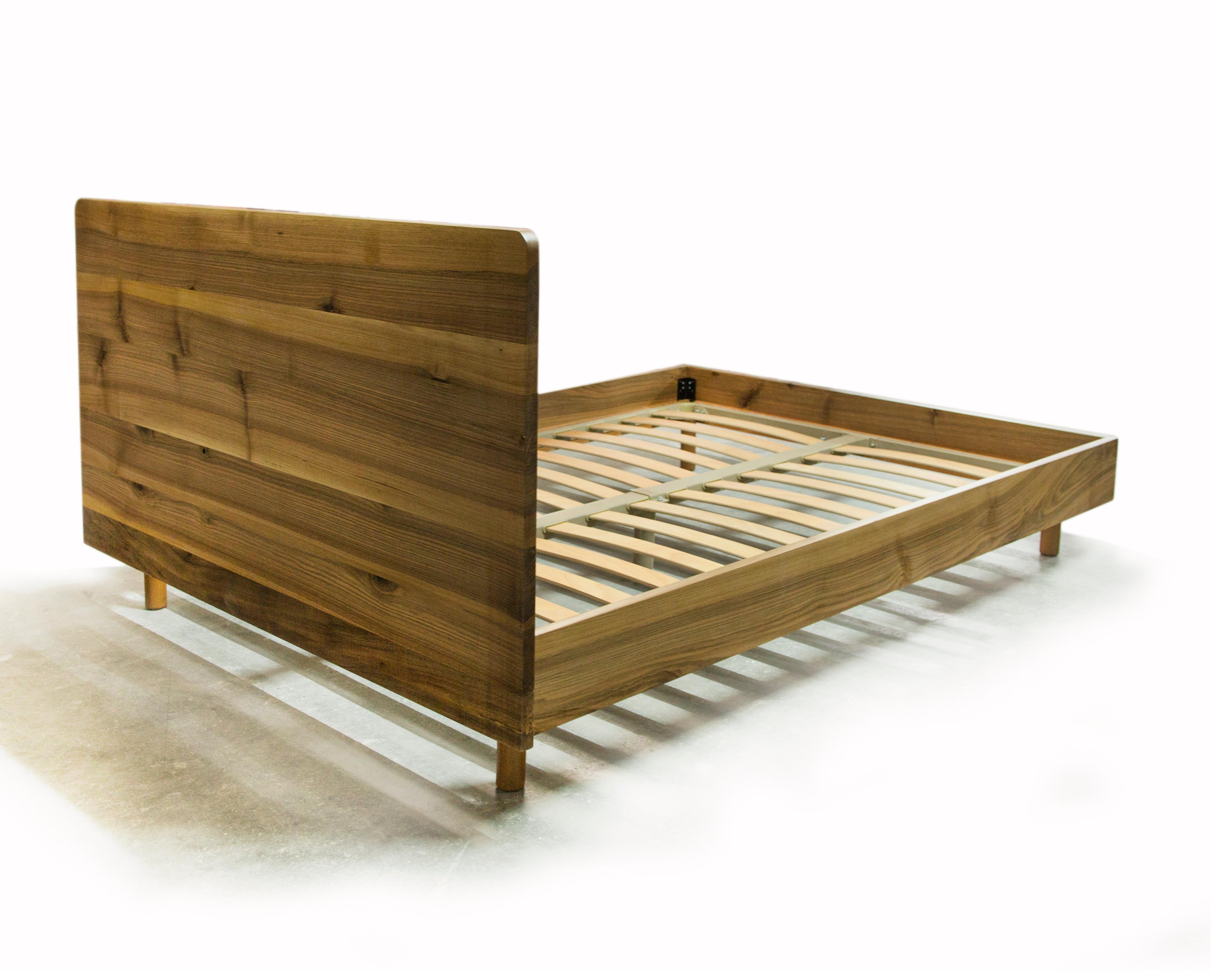 Emirgan bed by Rectangle Studio
Dimensions: W 153 x D 208.5 x H 100 cm 
 140 cm for warm mattress
Materials: Massive walnut, natural wood oil

Emirgan 'bed is designed to feel the material and sleep with the smell of massive wood.

Emirgan