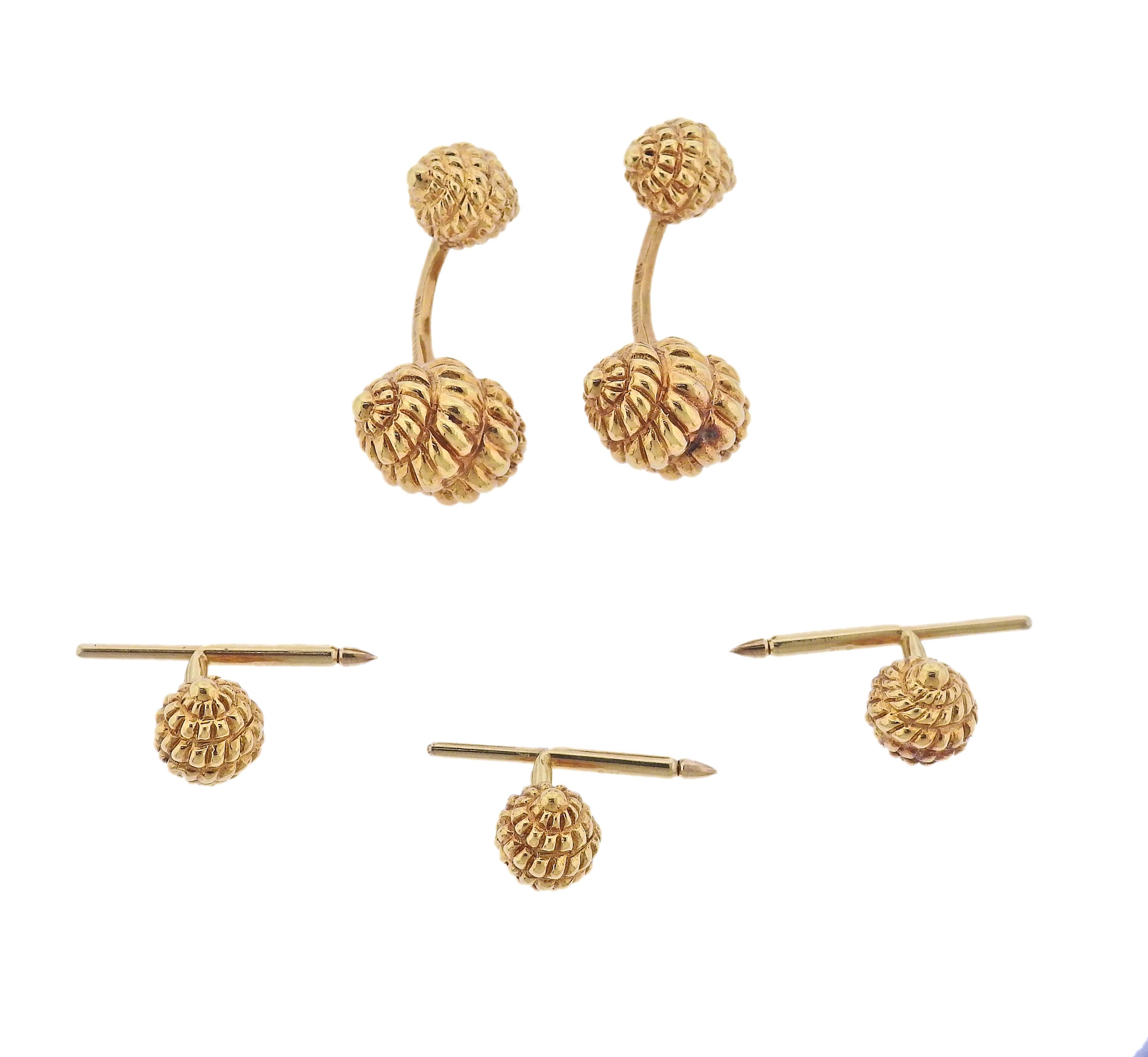 18k yellow gold woven cufflinks and stud set by Emis. Cufflink top is 20mm x 13mm,  back - 13mm x 10mm, Stud - 13mm x 10mm. Marked 18k Emis. Weight - 33.2 grams.