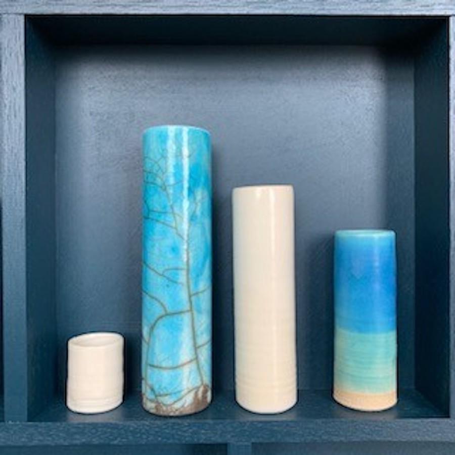 Emma Bell
73cmx73cmx 7cm
Three clays XIII
Emma Bell’s ceramic and porcelain Pot Frame – Installation Piece.
Emma Bell says: “This piece is inspired by my glaze test vessels. As a potter, I am always staggered by how different the same/similar glaze