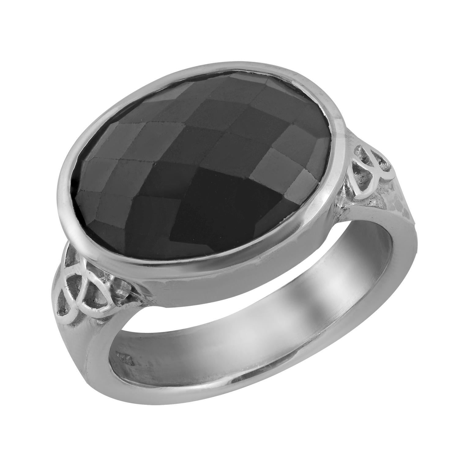 This striking unisex black spinel ring has been handmade in our workshops. It features a black spinel, which is set in hammered and oxidized sterling silver  with a celtic motif on the side.

Ring dimensions - 20mm x 11mm

Ring size - UK - W/ USA -