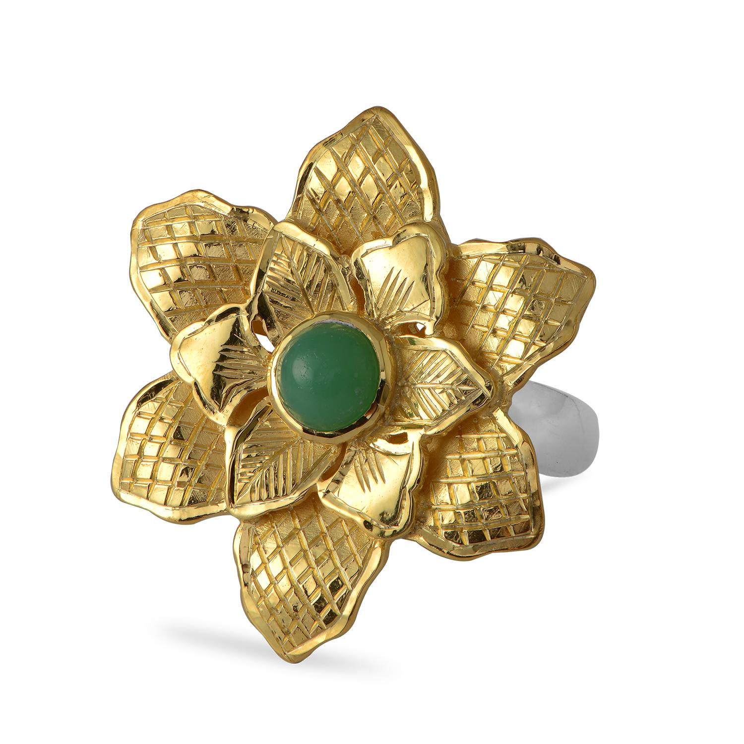 

This gorgeous Chrysoprase Gold Plate Statement Flower Ring,  has been handmade in our workshops. It features exquisite hand engraving work on each petal and is embedded with a chrysoprase. The ring is made in sterling silver coated with 24kt gold