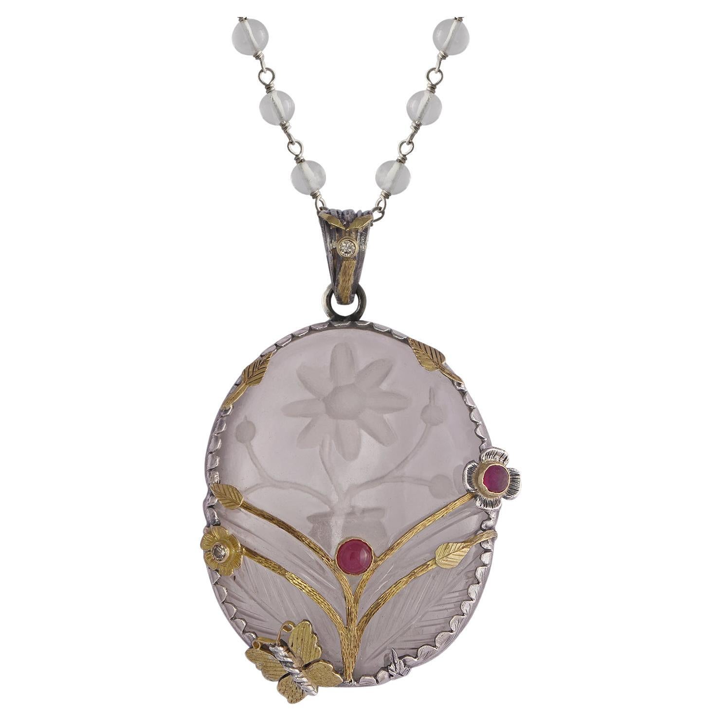 Pendentif fantaisie en argent et or 18 carats avec cristal, rubis et diamant