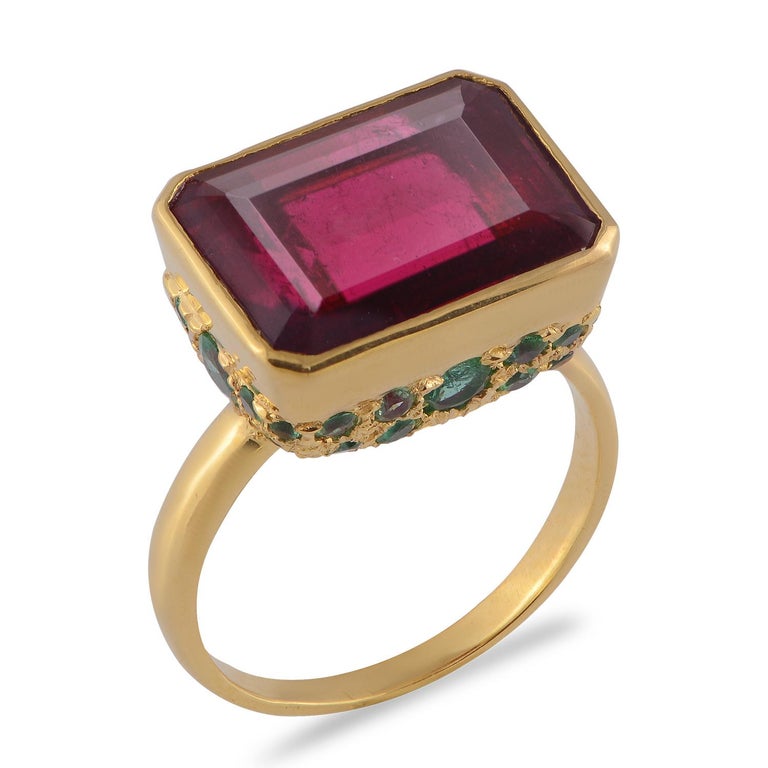 

This stunning  Rubellite Emerald 18 Karat Gold Statement Ring, is one of a kind ring and has been handmade in our workshops. It has a 9.85kt rubellite which is surrounded by emeralds. The ring is made in 18 karat gold.

Dimensions 15mm x 12mm

UK