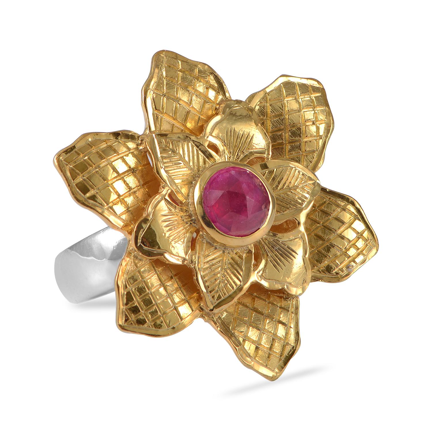 

This lovely Ruby Gold Plate Statement Flower Ring, has been handmade in our workshops. Each petal has been exquisitely hand engraved and the ring is embedded with a ruby. It is made in sterling silver capped with 24kt gold vermeil. The ring has