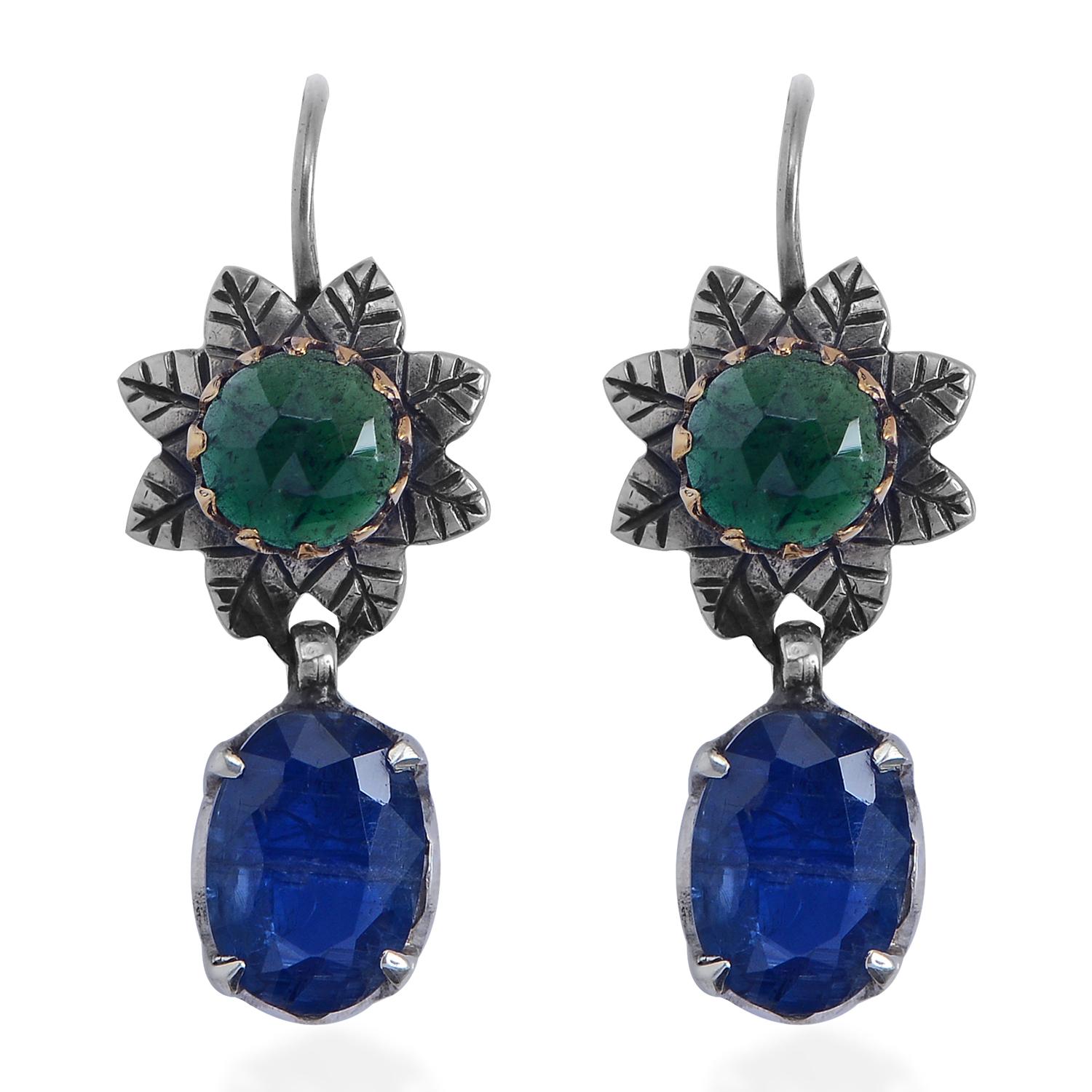 The Tanzanite Diopside Silver 18 Karat Gold Drop Earrings are one of a kind earrings. Handmade in our workshops, they have tanzanite oval shaped drops, which are capped with chrome diopside set in 18kt gold in hand engraved sterling silver .flower