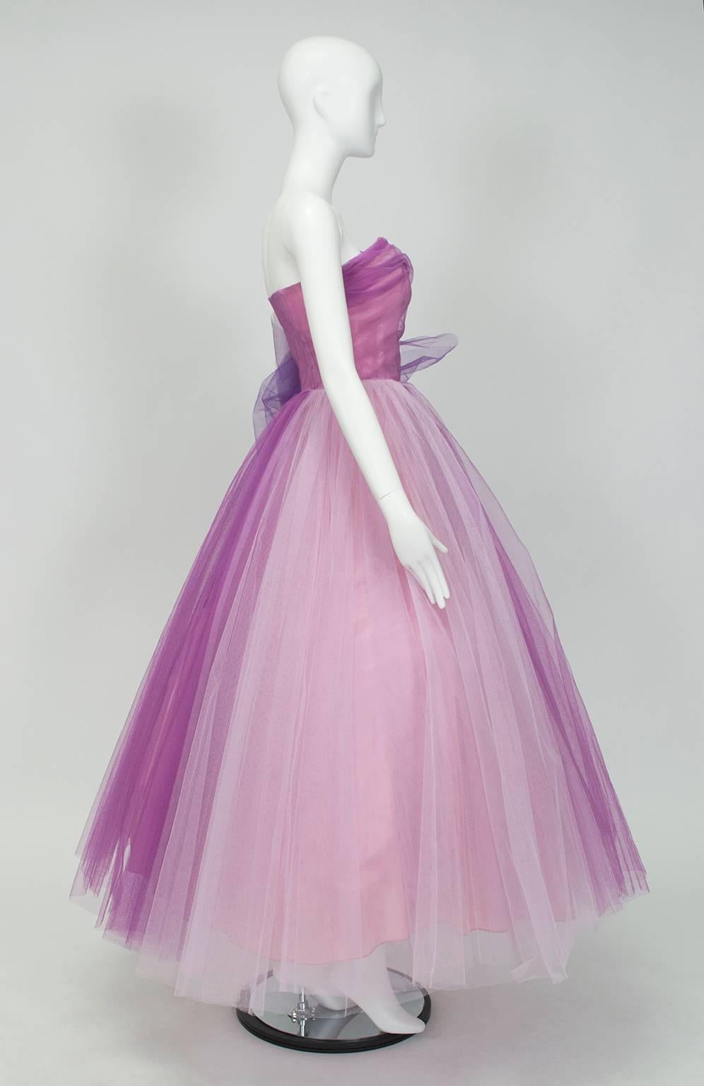 No shrinking violets here: with three shades of regal purple and a strapless ruched bodice, this gown is positively guaranteed to attract attention (as will the nearly 8-foot wide skirt)!

Strapless ball gown with ruched sweetheart surplice bodice